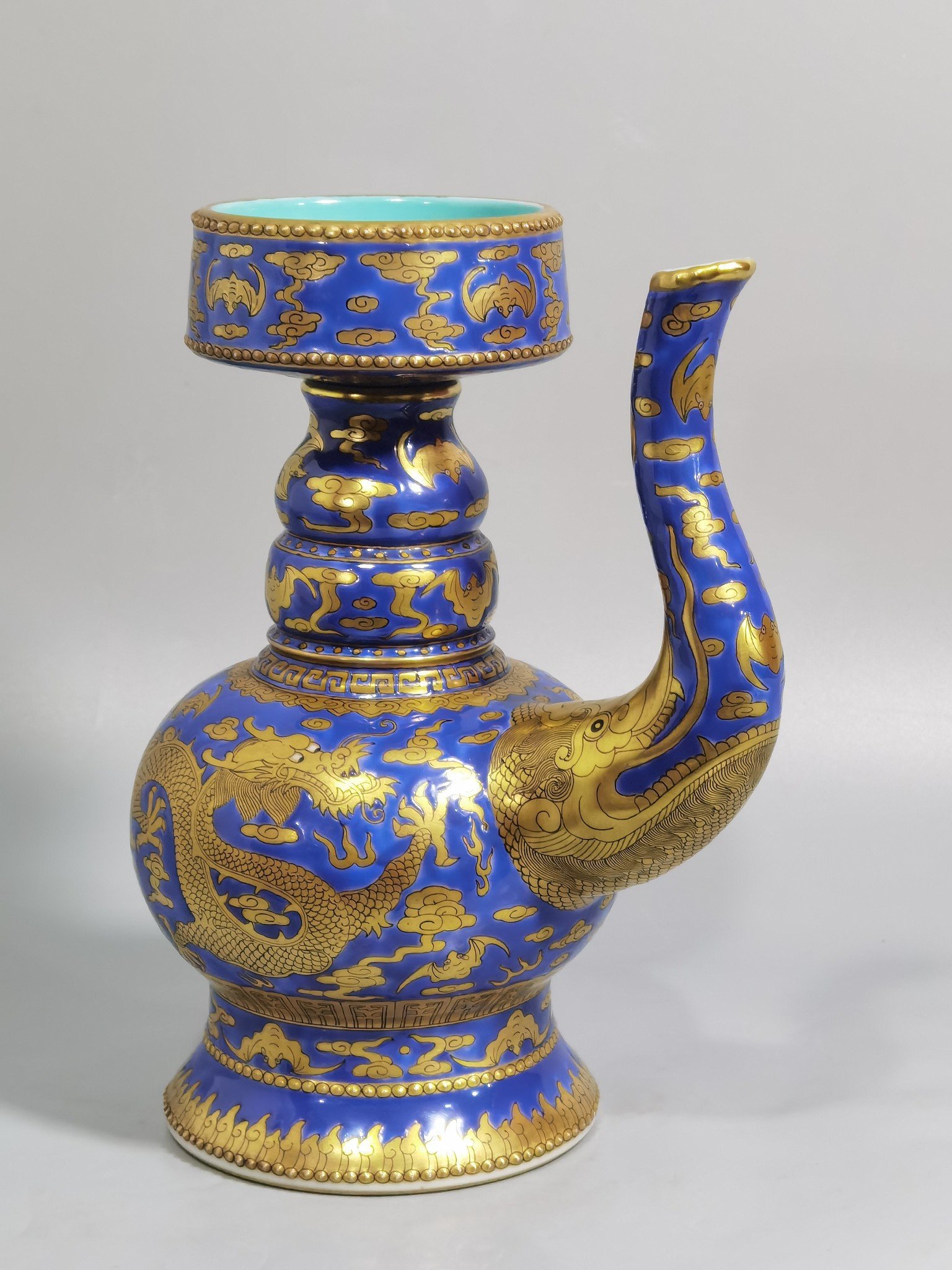 Qing Dynasty Jiaqing blue ground gold cloud and dragon pattern spray bottle