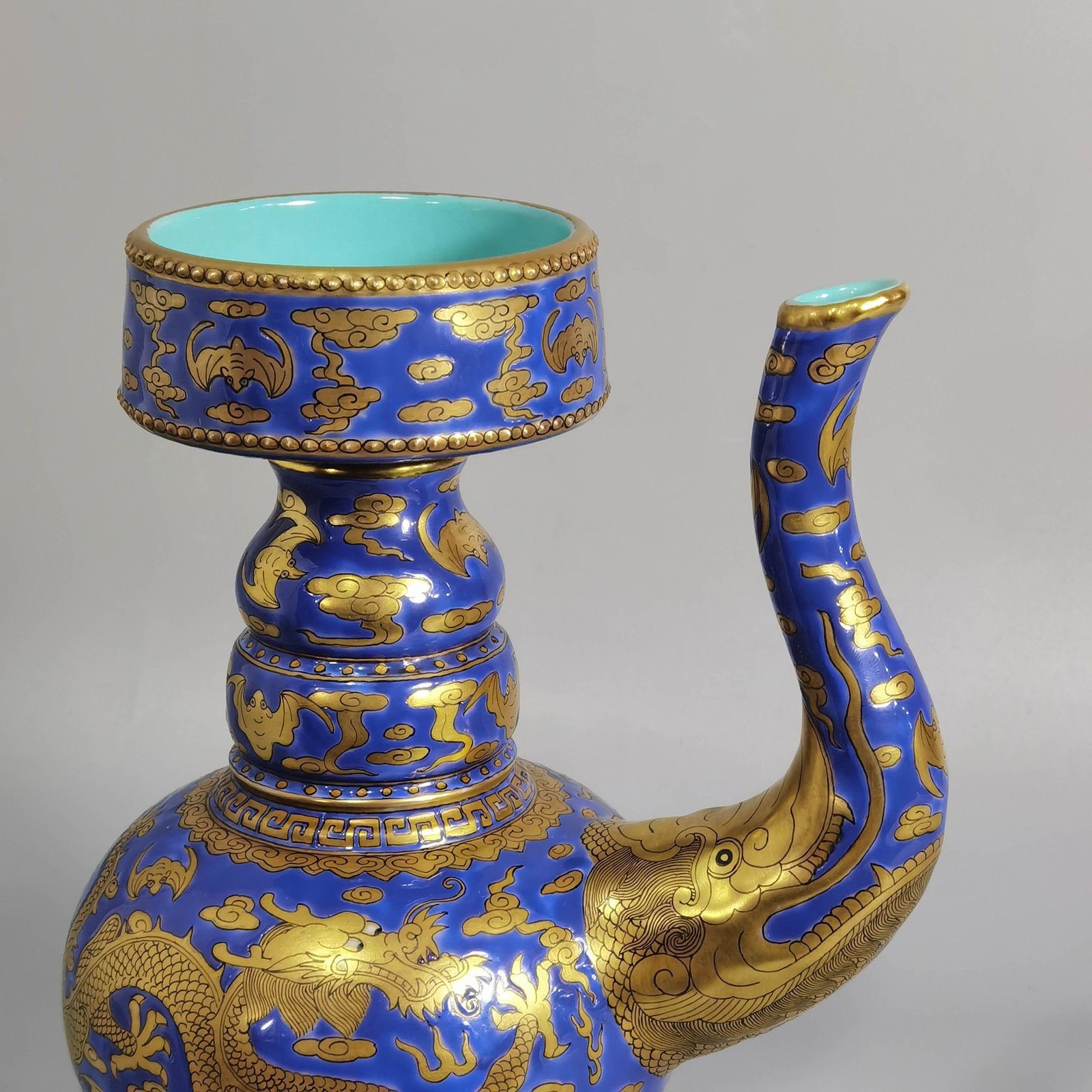 Qing Dynasty Jiaqing blue ground gold cloud and dragon pattern spray bottle