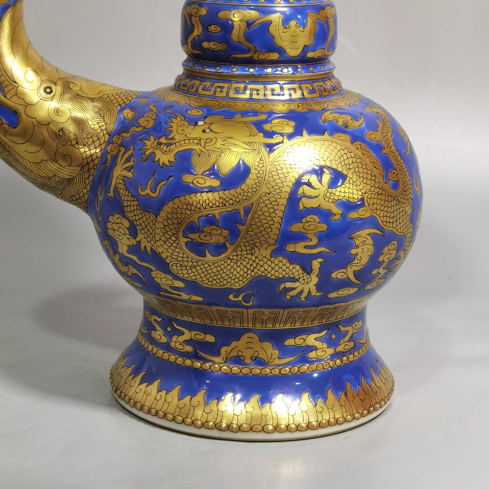 Qing Dynasty Jiaqing blue ground gold cloud and dragon pattern spray bottle