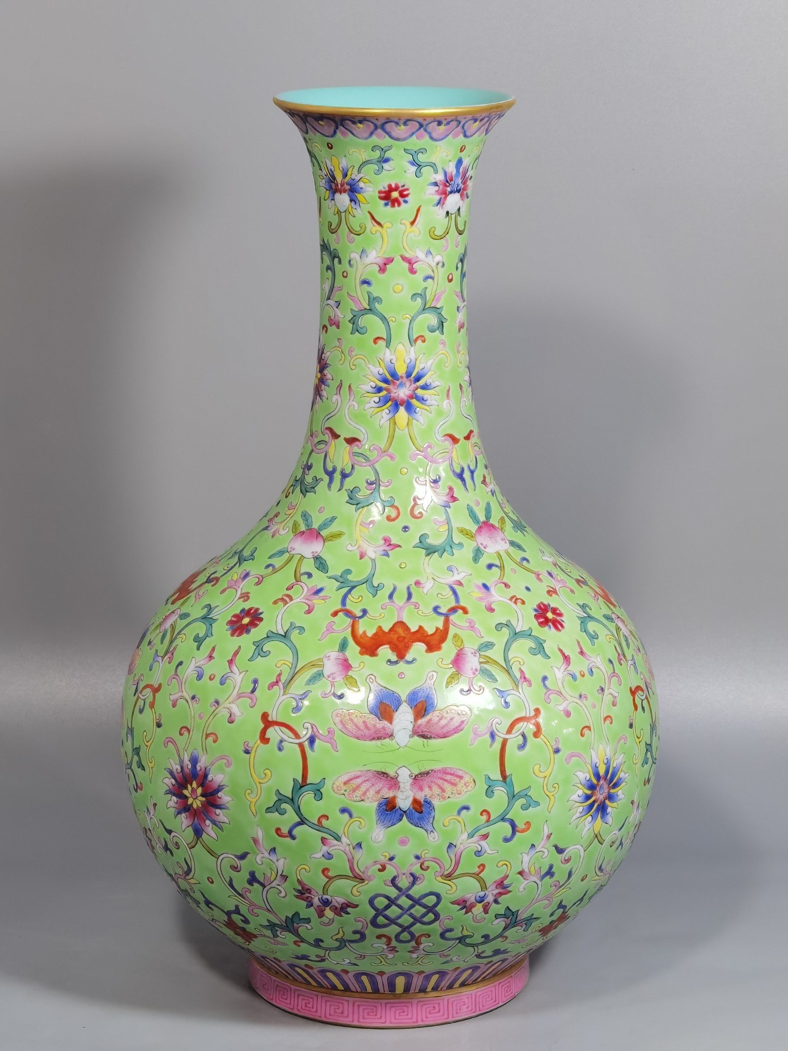 Qing Dynasty Jiaqing style okra green land pastel blessing and longevity entwining lotus pattern vase