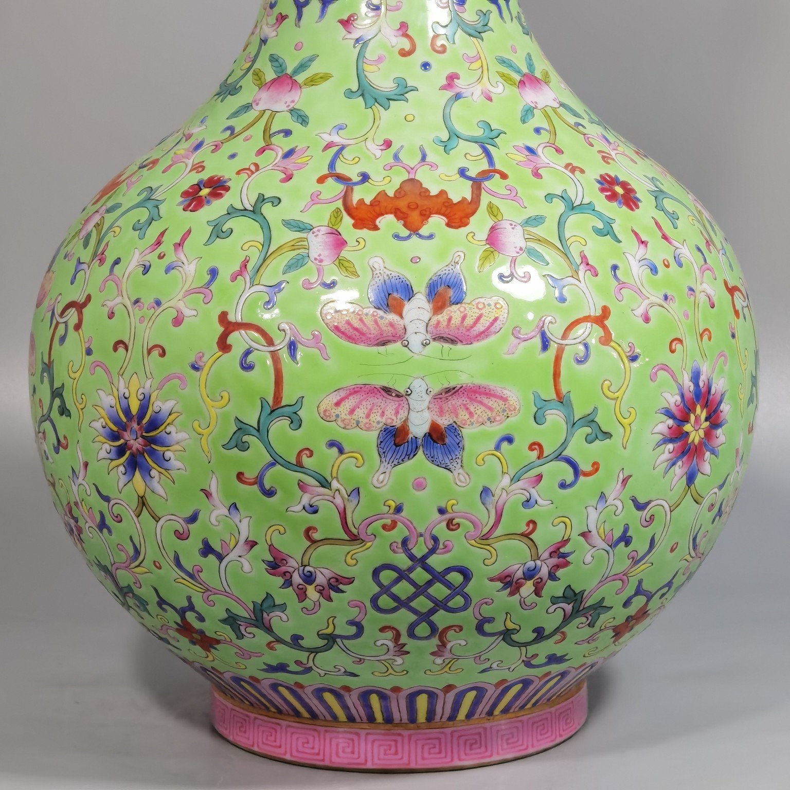 Qing Dynasty Jiaqing style okra green land pastel blessing and longevity entwining lotus pattern vase