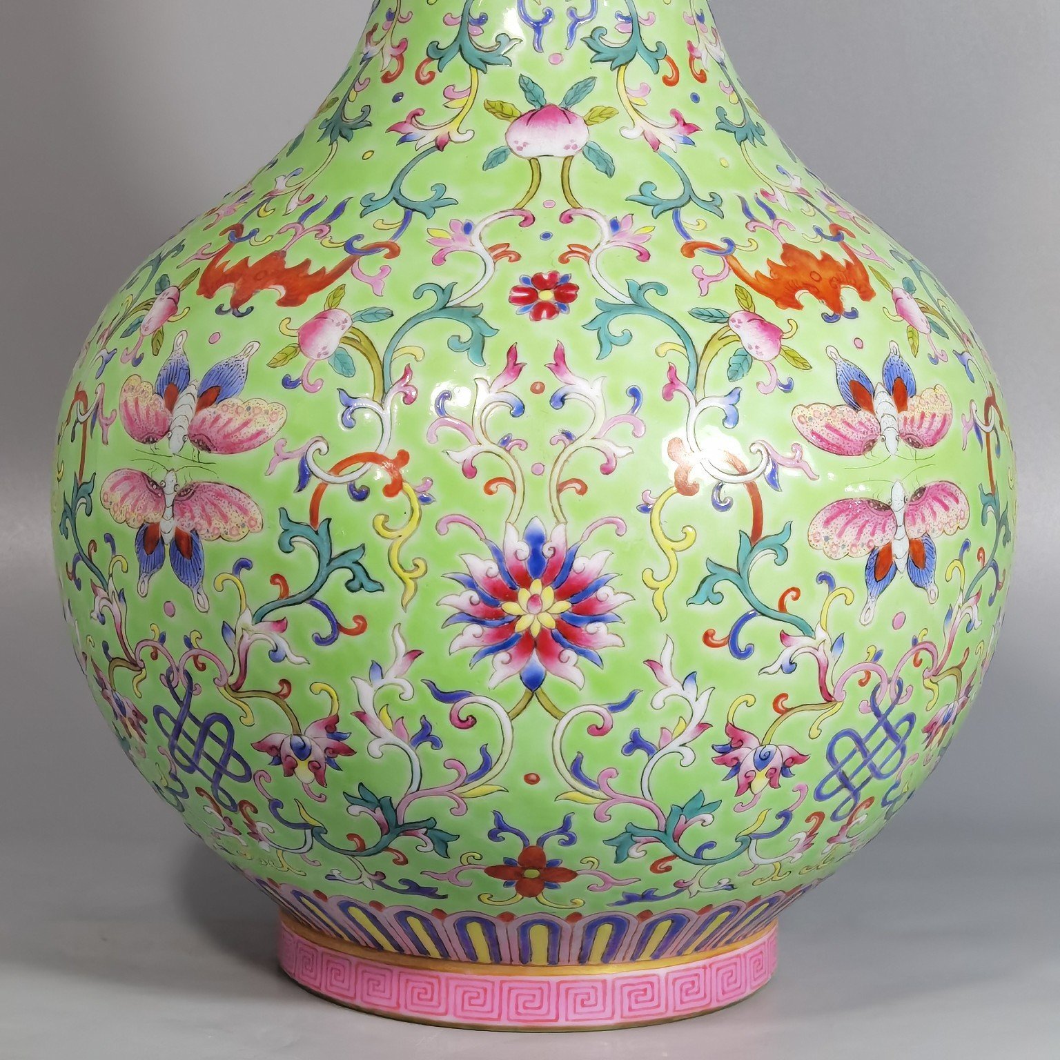 Qing Dynasty Jiaqing style okra green land pastel blessing and longevity entwining lotus pattern vase