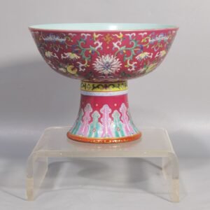 Qing Dynasty Jiaqing a rouge-red ground Fushou Twisting Lotus tall bowl