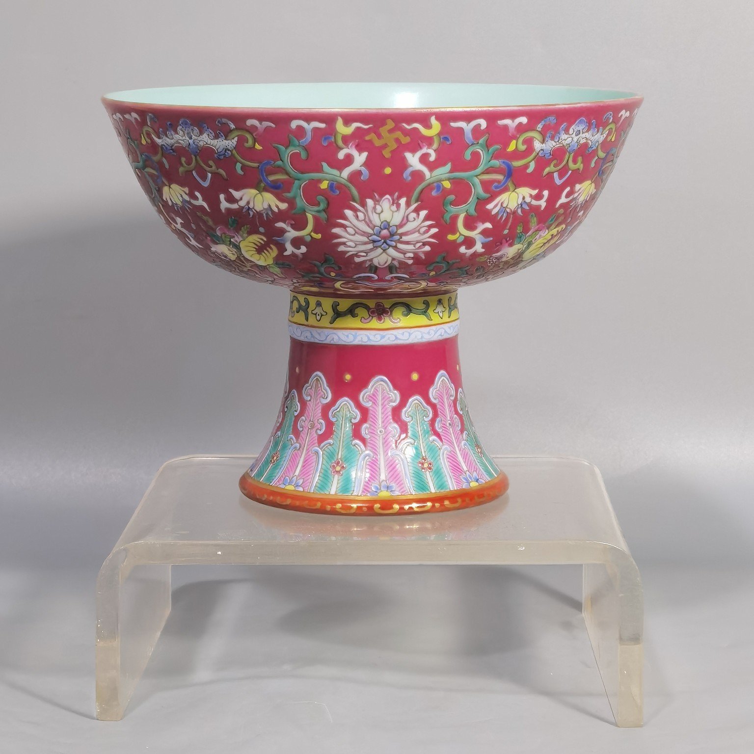 Qing Dynasty Jiaqing a rouge-red ground Fushou Twisting Lotus tall bowl