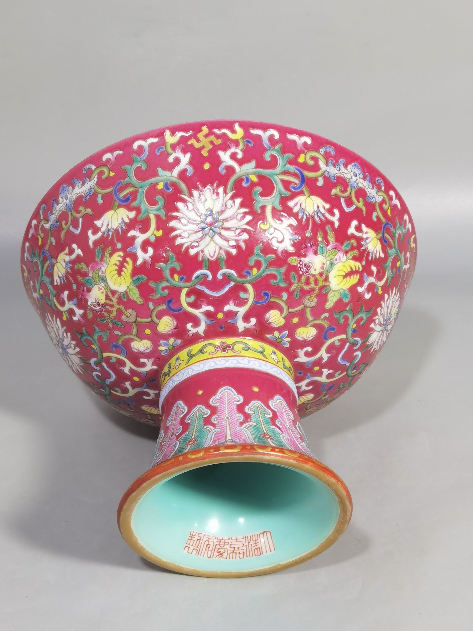 Qing Dynasty Jiaqing a rouge-red ground Fushou Twisting Lotus tall bowl
