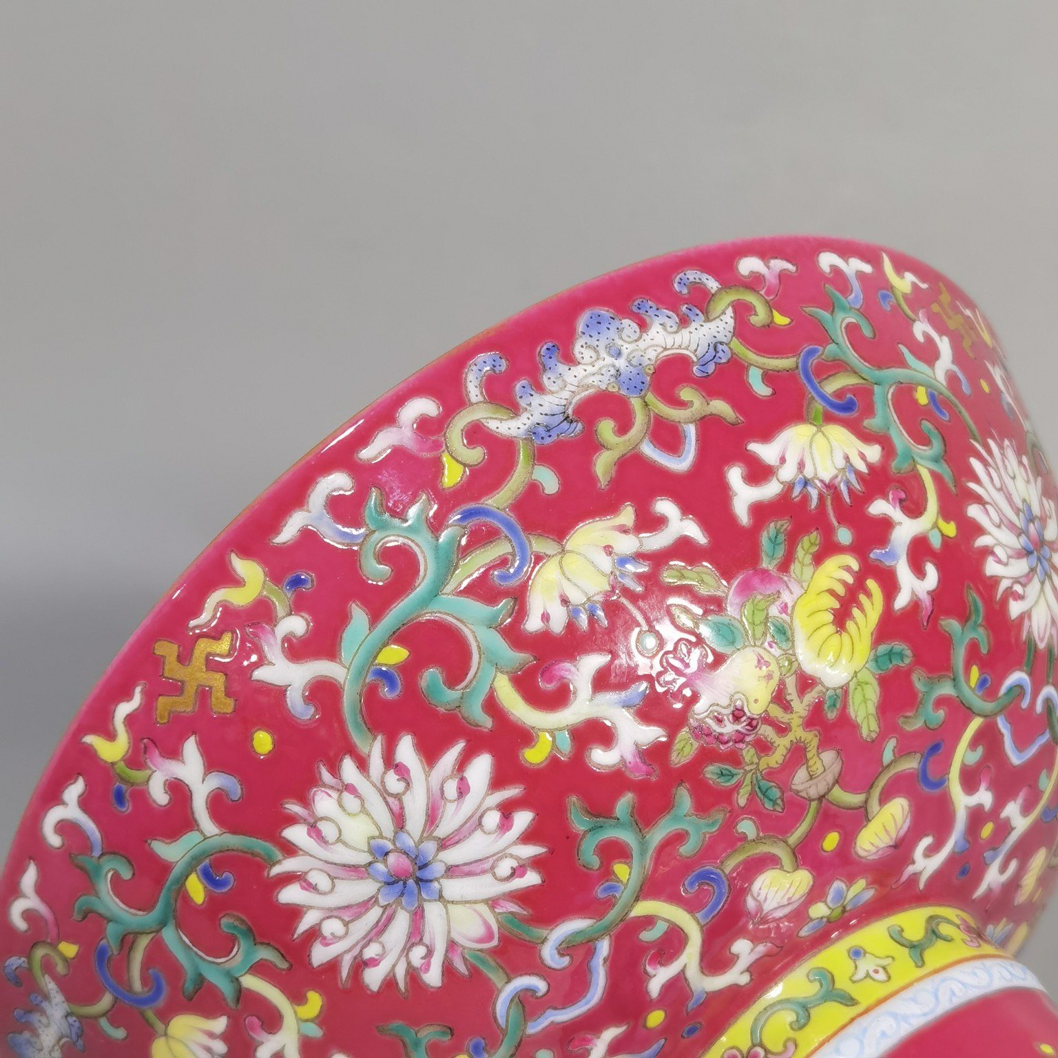 Qing Dynasty Jiaqing a rouge-red ground Fushou Twisting Lotus tall bowl