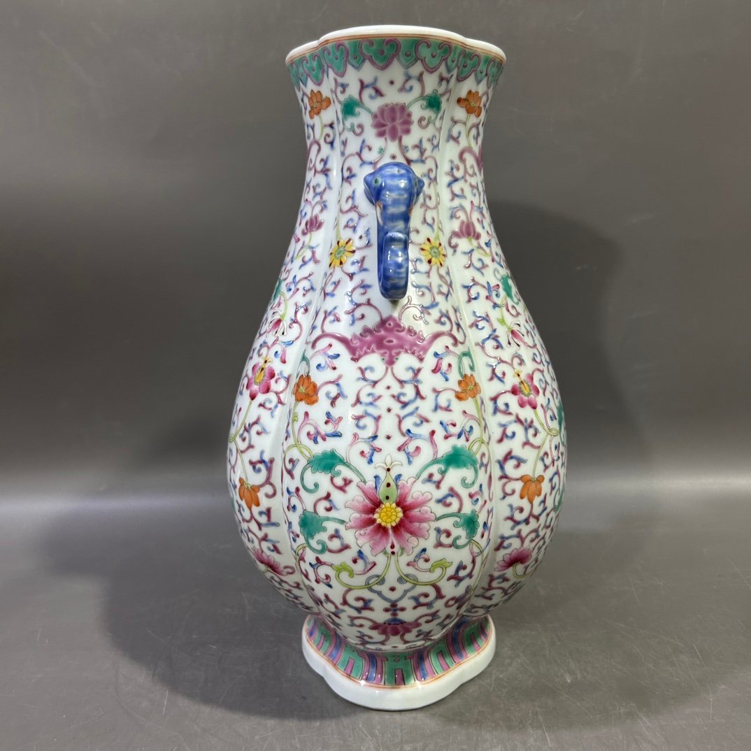 Qing Dynasty Jiaqing pastel lotus and elephant ear vase