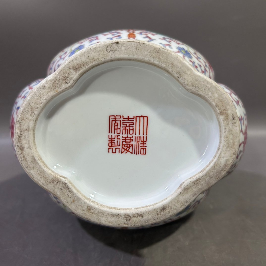 Qing Dynasty Jiaqing pastel lotus and elephant ear vase