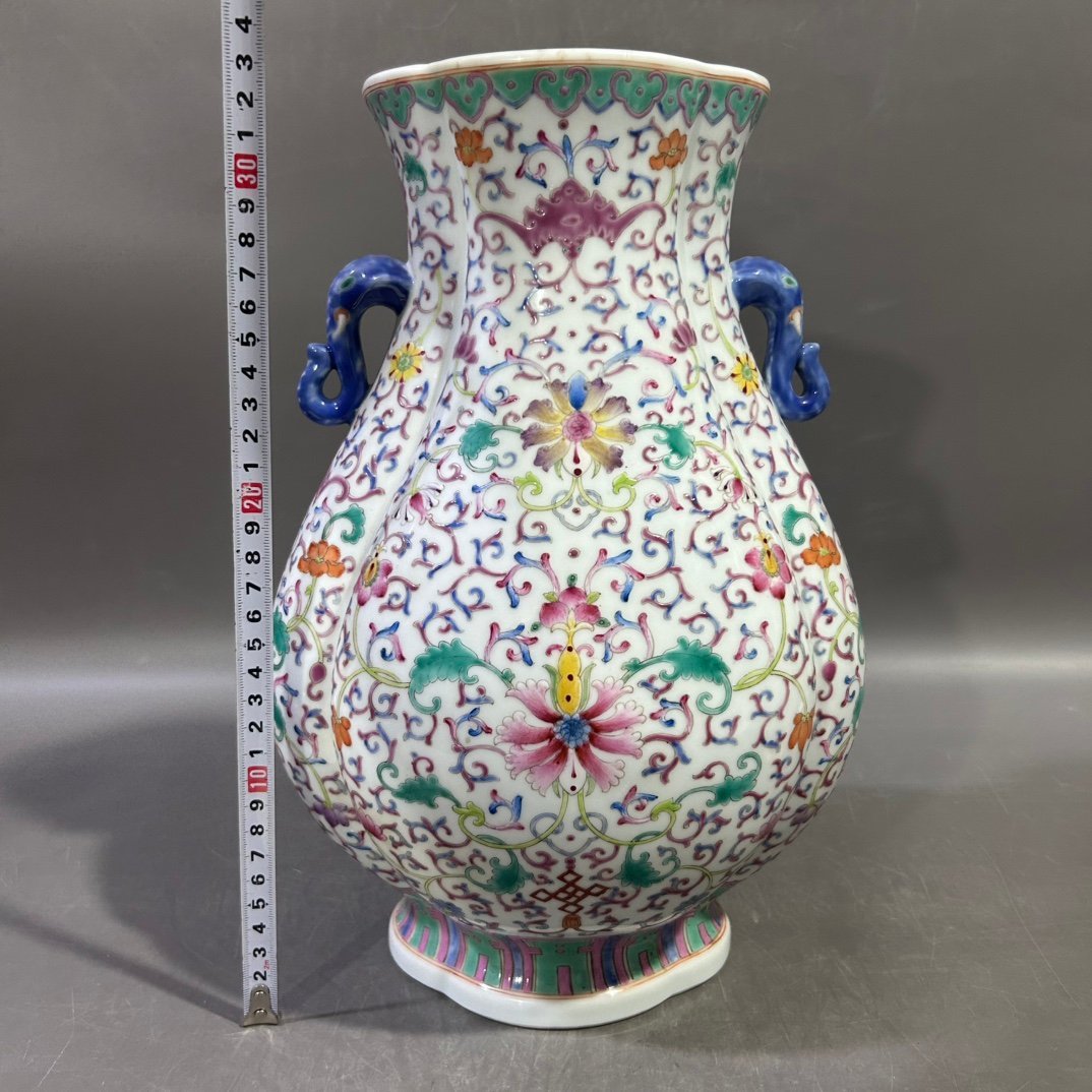 Qing Dynasty Jiaqing pastel lotus and elephant ear vase