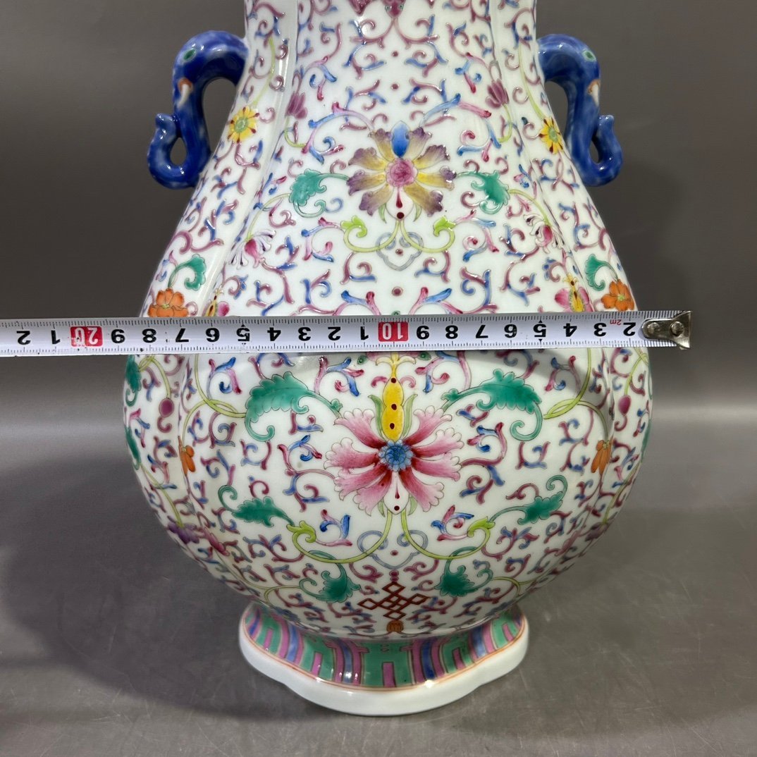 Qing Dynasty Jiaqing pastel lotus and elephant ear vase