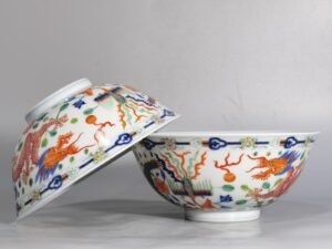 Qing Dynasty Kangxi A pair of blue and white palace bowls with colorful dragon and phoenix patterns