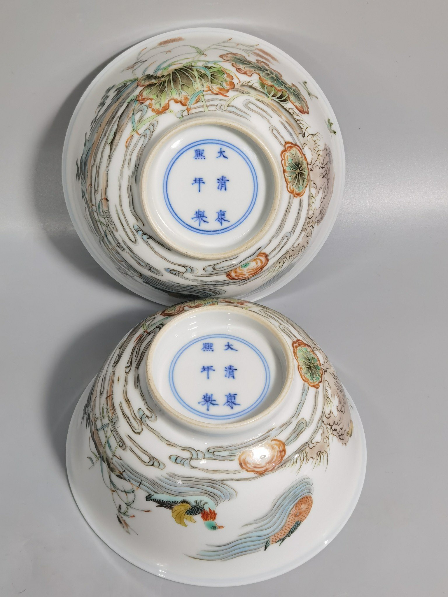 Qing Dynasty Kangxi pair of colorful mandarin duck lotus and kingfisher bowls