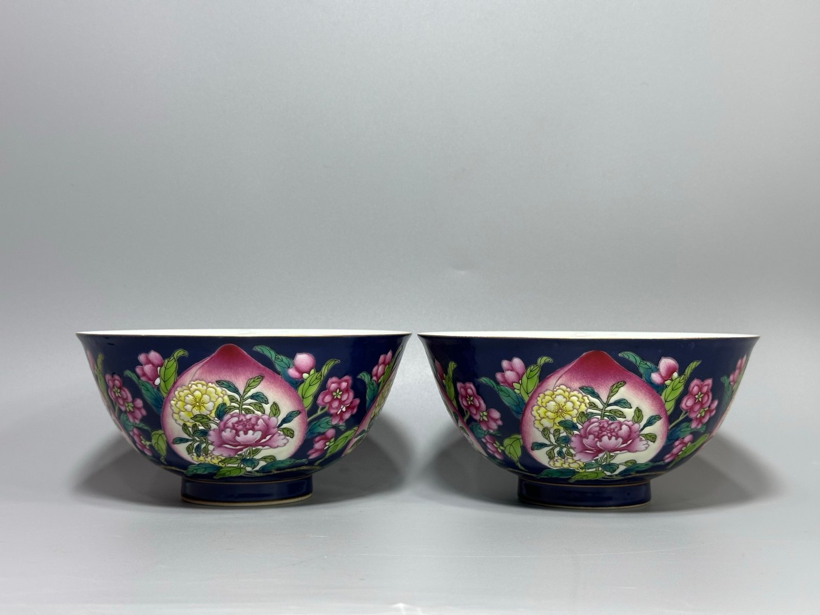 Qing Dynasty Kangxi year blue bowl with peach and flower pattern