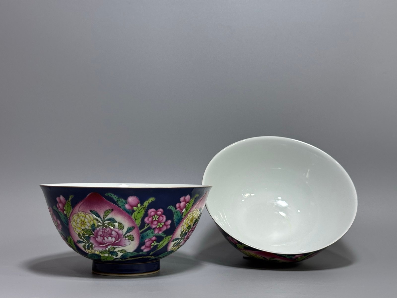 Qing Dynasty Kangxi year blue bowl with peach and flower pattern