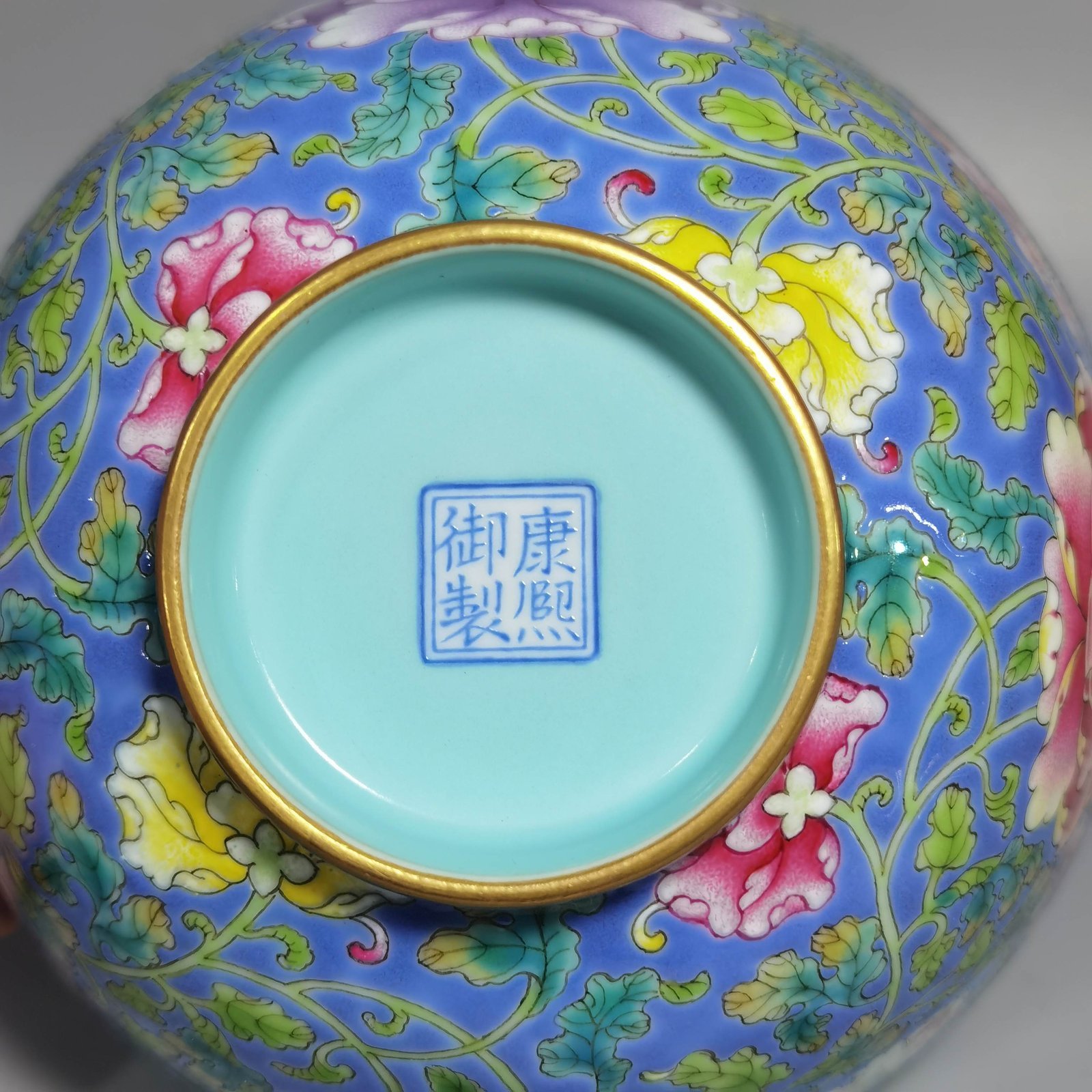 Qing Dynasty Kangxi imperial enamel blue ground lotus and peony flower bowl
