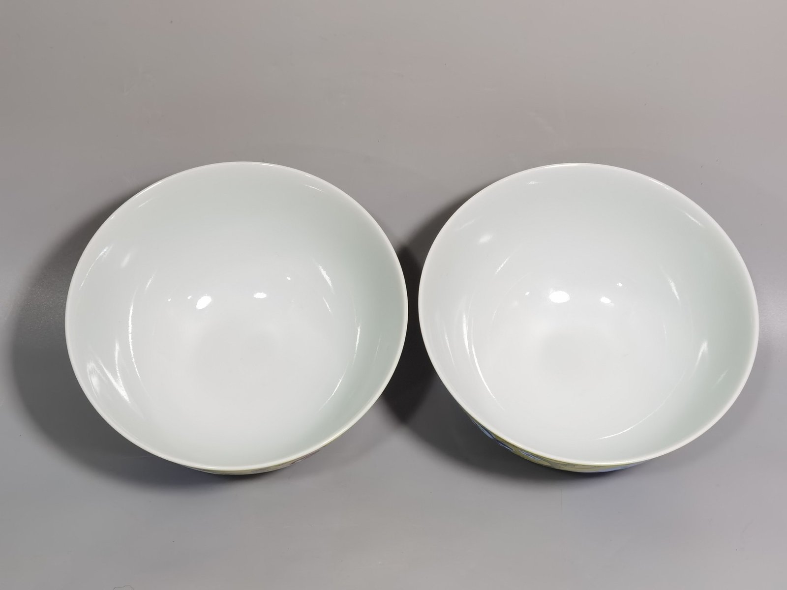 Qing Dynasty Kangxi Imperial enamel bowl with flowers and longevity characters on the ground