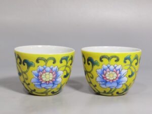 Qing Dynasty Kangxi pair of yellow enamel flower cups