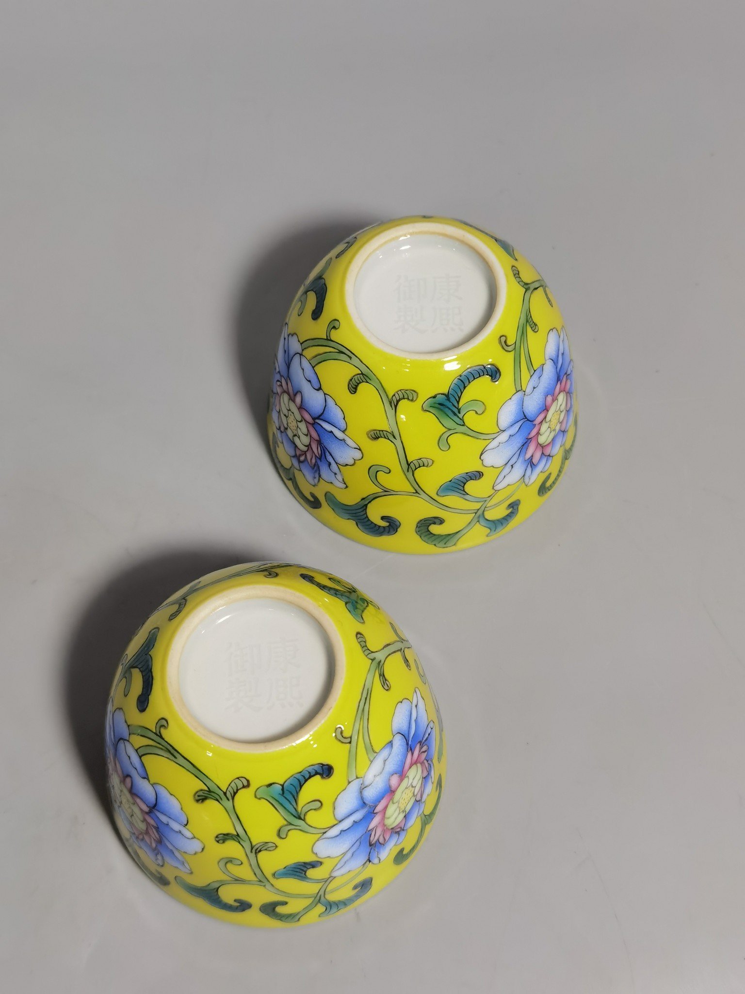 Qing Dynasty Kangxi pair of yellow enamel flower cups
