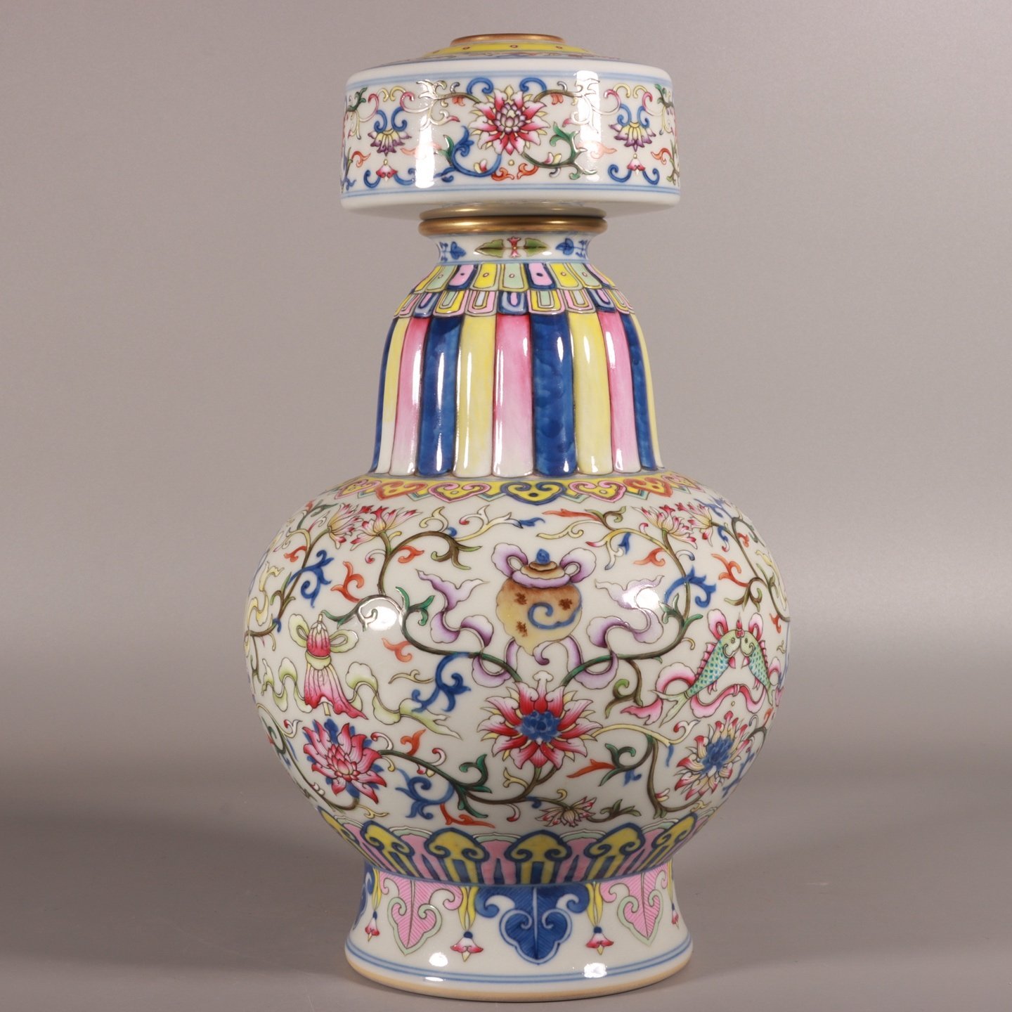 Qing Dynasty Qianlong Doucai lotus and eight-treasure pattern spray vase