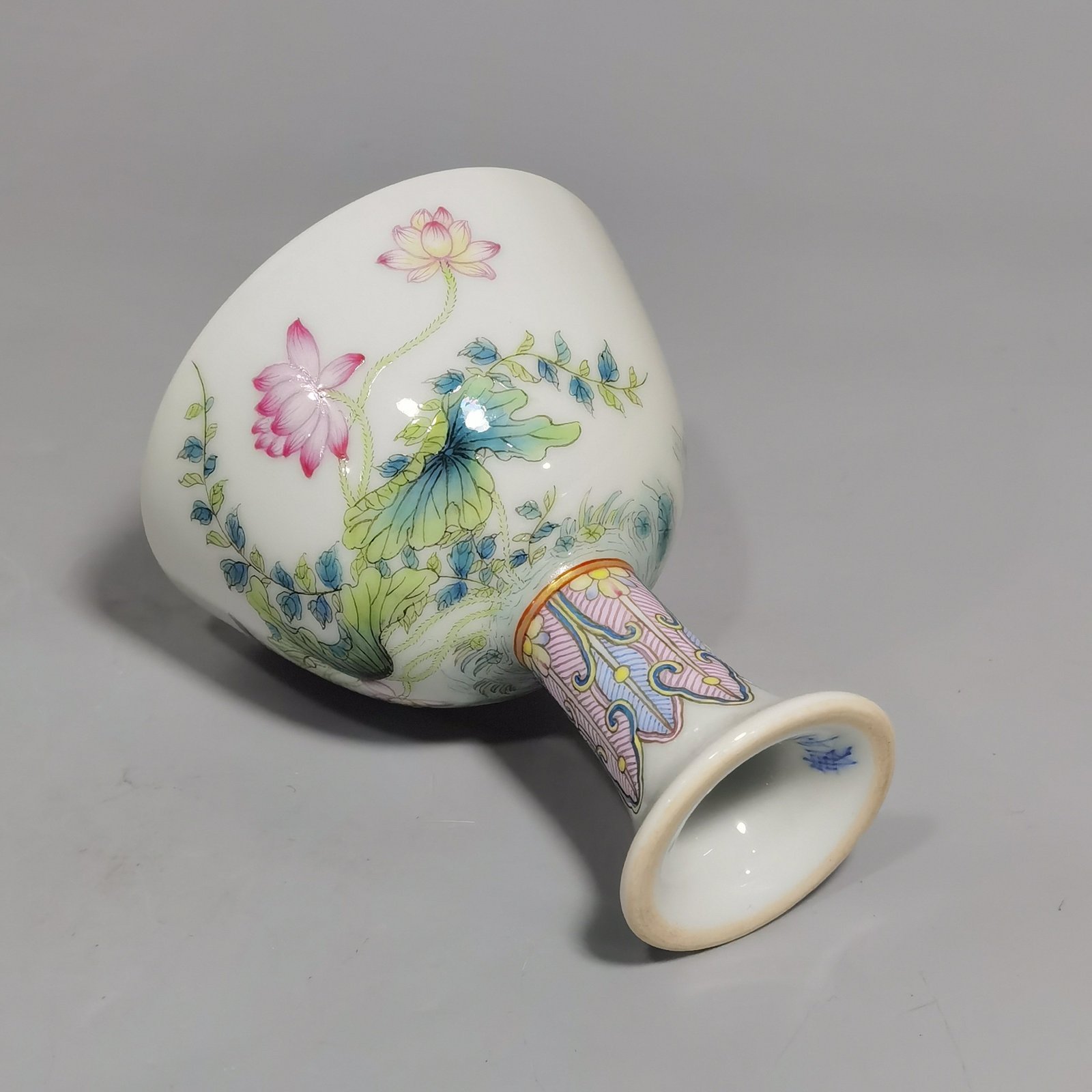 Qing Dynasty Yongzheng A pair of pastel mandarin duck and lotus goblets