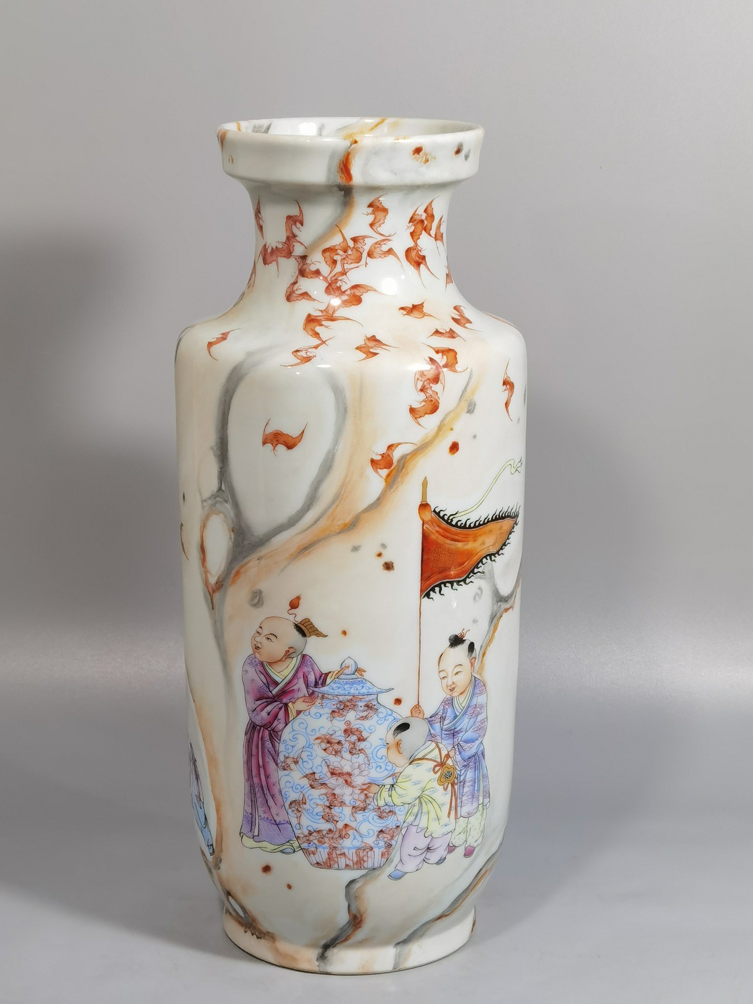 Qing Dynasty Yongzheng a moire pastel boy’s happy straight barrel bottle
