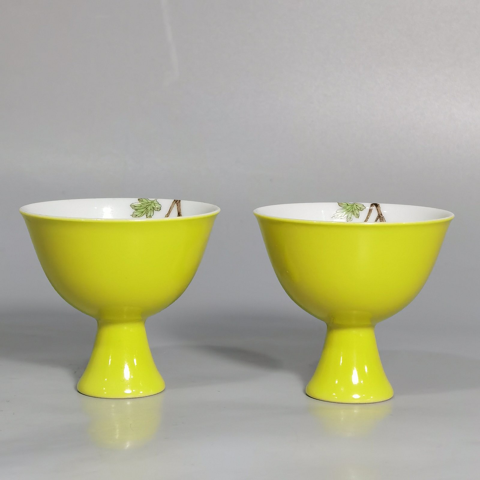 Qing Dynasty Yongzheng a pair of goblets with pastel flowers and birds