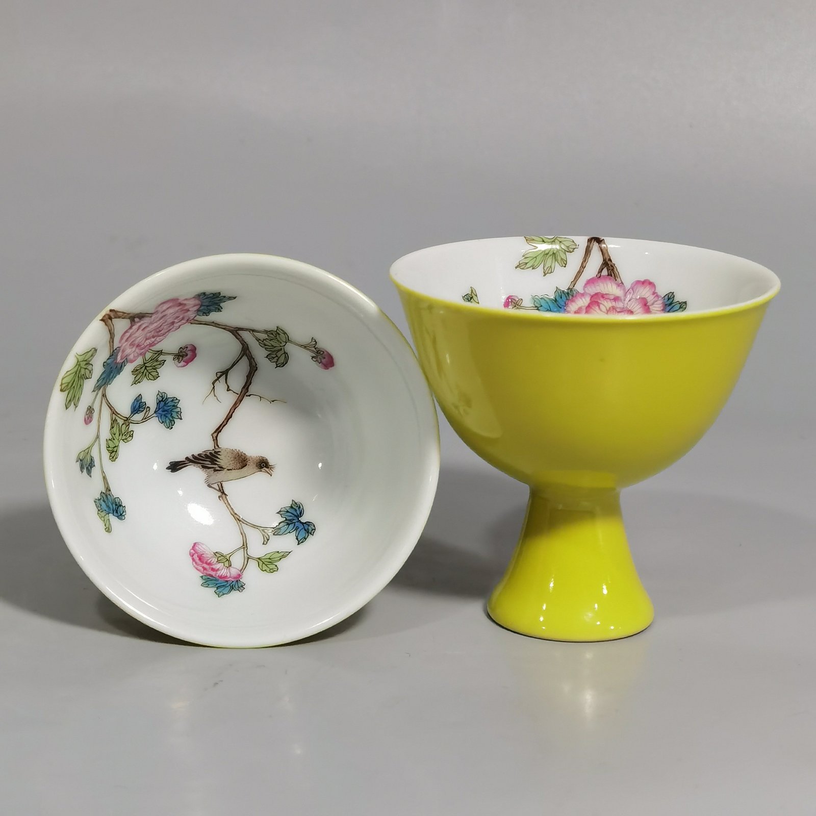 Qing Dynasty Yongzheng a pair of goblets with pastel flowers and birds
