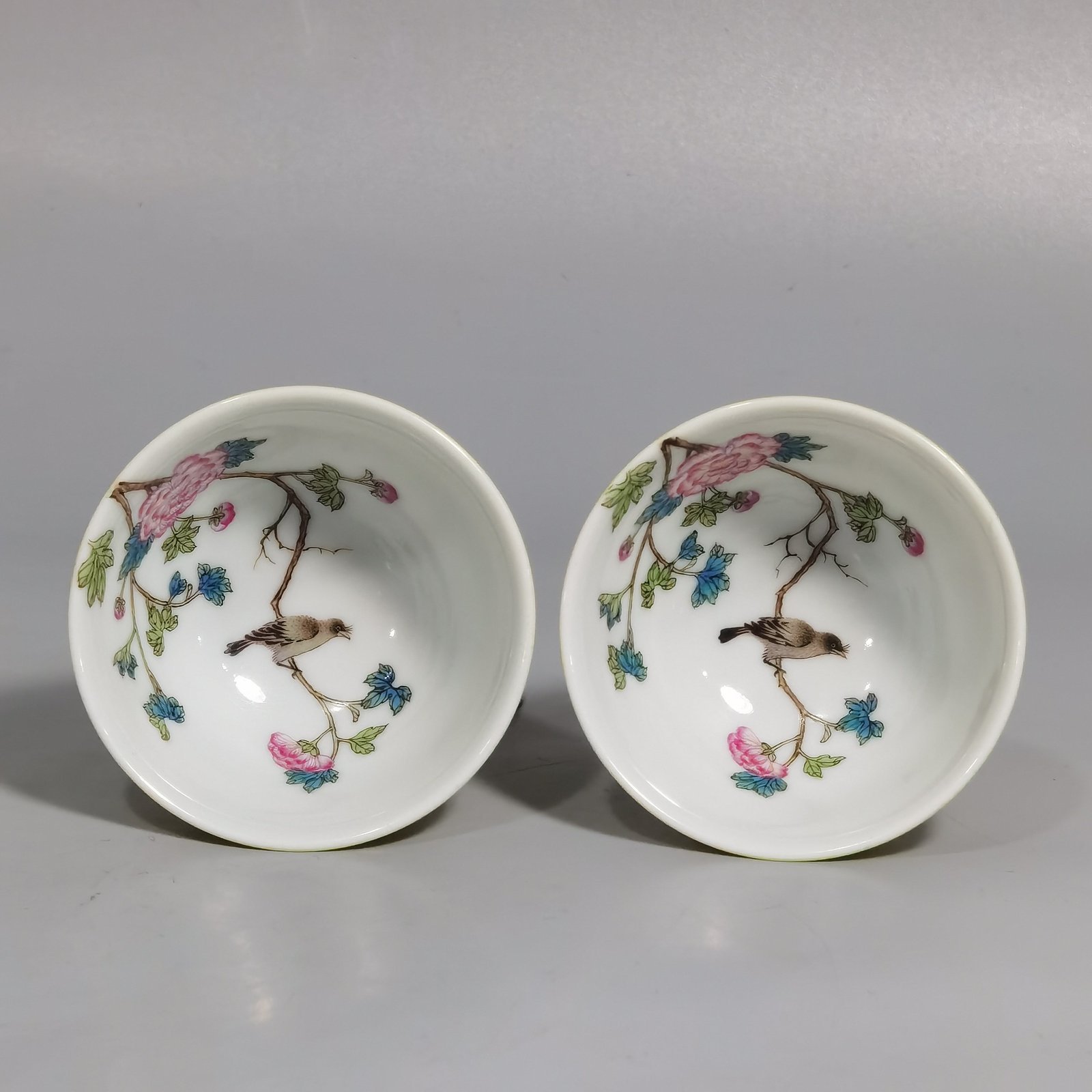 Qing Dynasty Yongzheng a pair of goblets with pastel flowers and birds