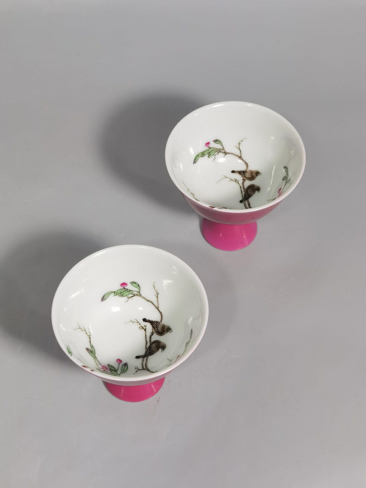 Qing Dynasty Yongzheng A pair of goblets with pastel-colored flowers and birds