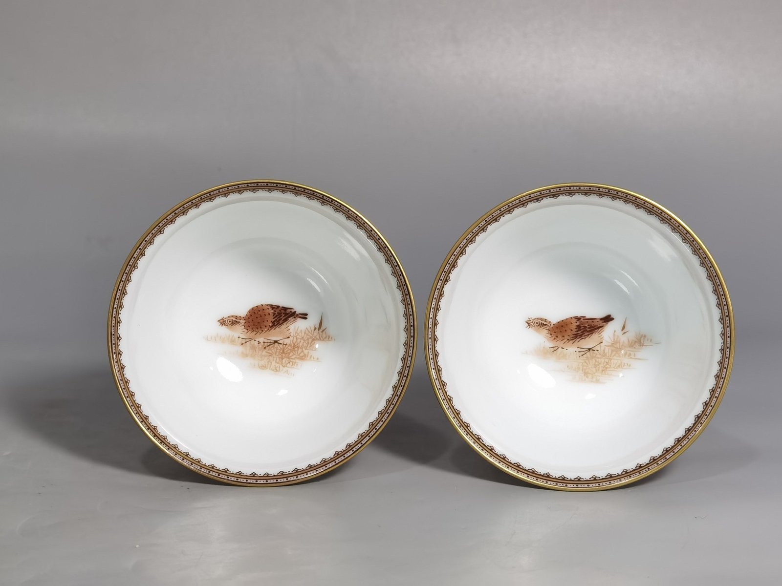 Qing Dynasty Yongzheng A pair of ink-colored (bamboo peace-telling) goblets