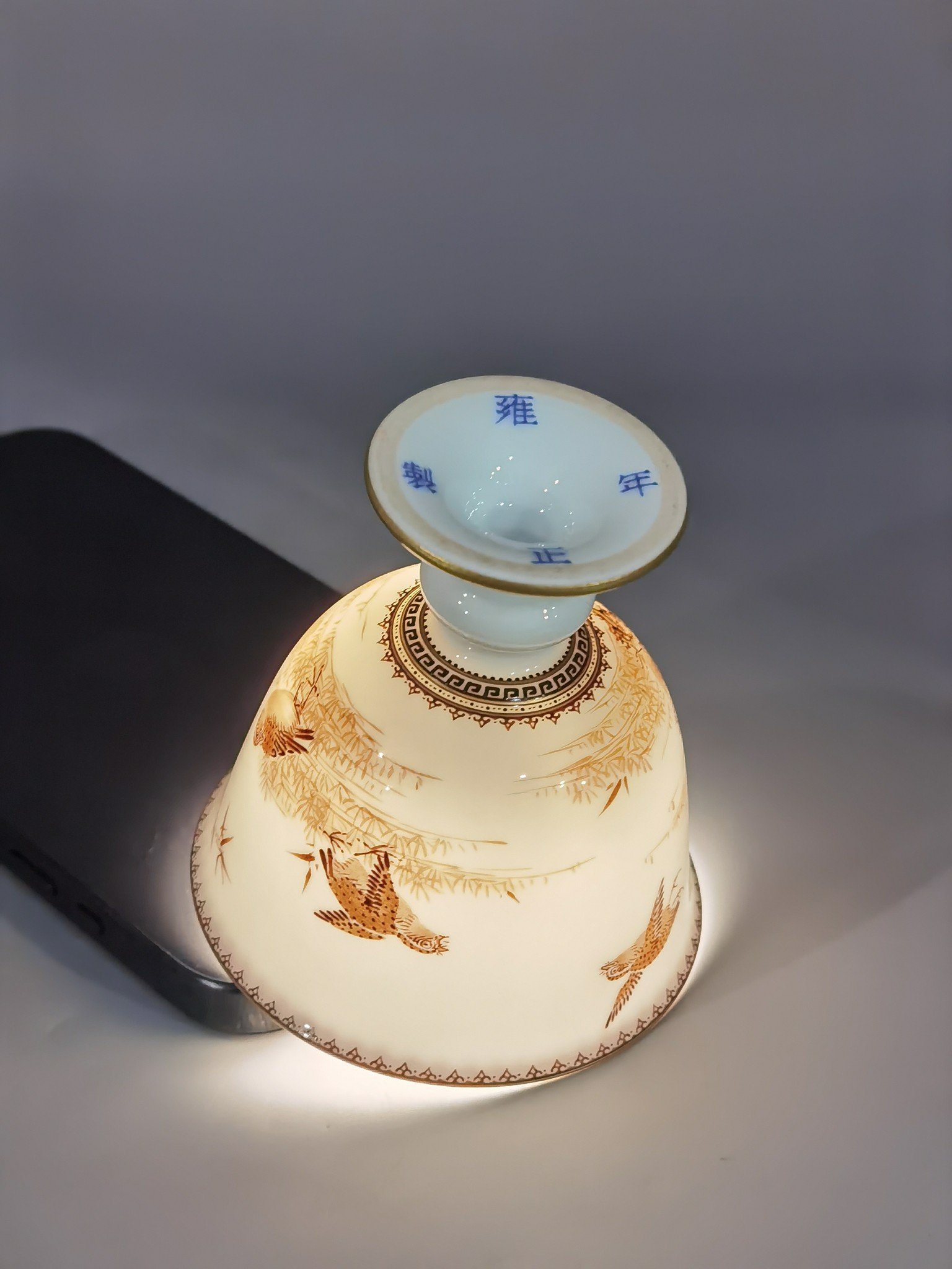 Qing Dynasty Yongzheng A pair of ink-colored (bamboo peace-telling) goblets