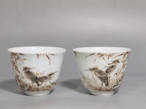 Qing Dynasty Yongzheng a pair of ink-color poetry cups with Lutang and waterbird patterns