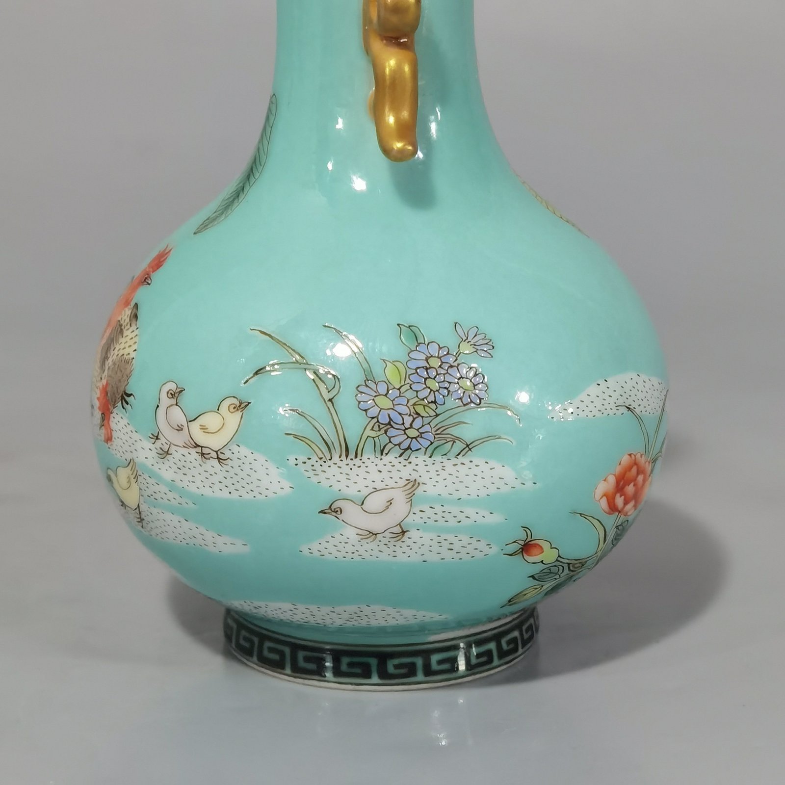 Qing Dynasty Yongzheng turquoise green land famille rose rooster amphora