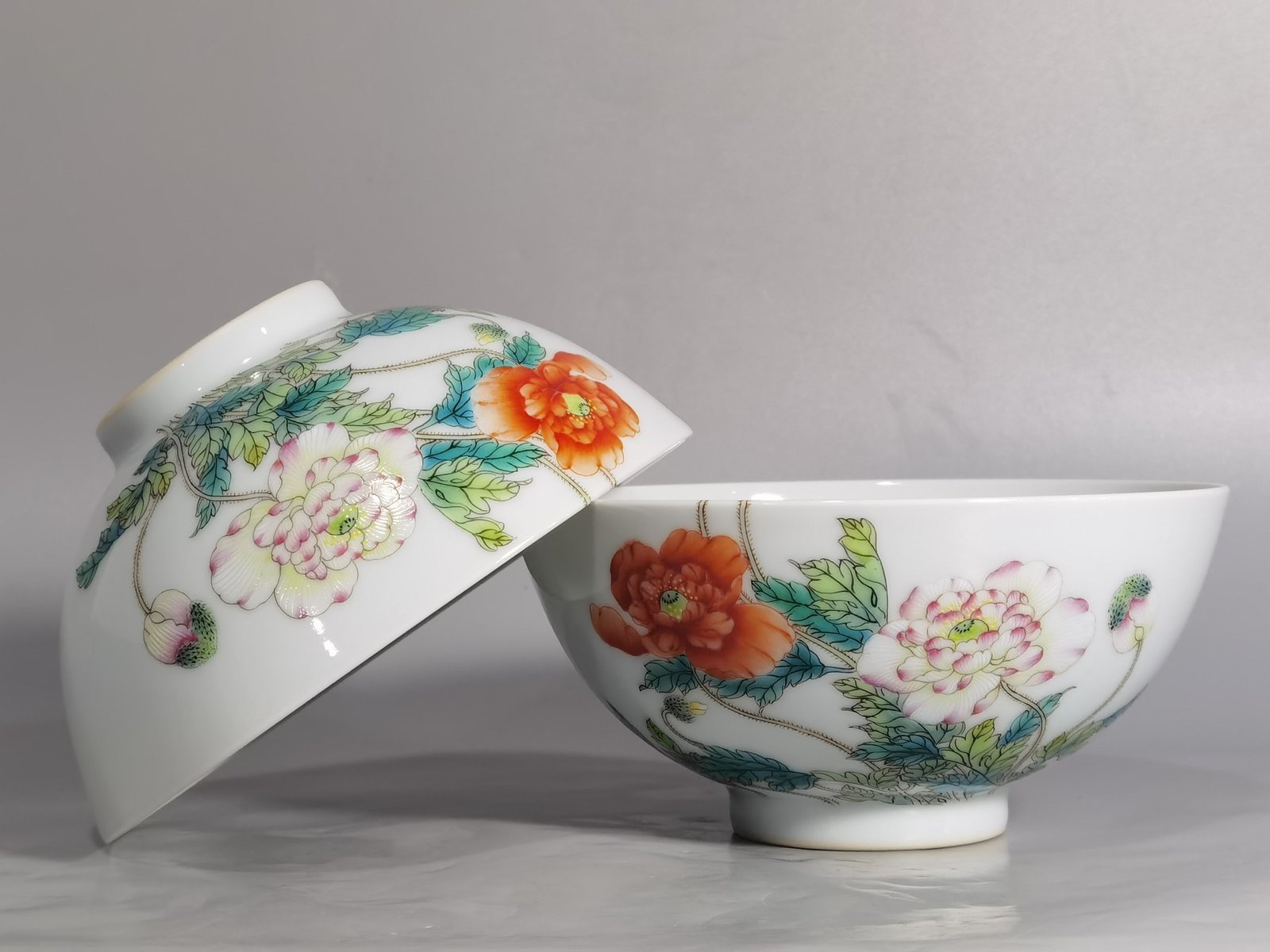 Qing Dynasty Yongzheng a pair of Yangcai poppy bowls