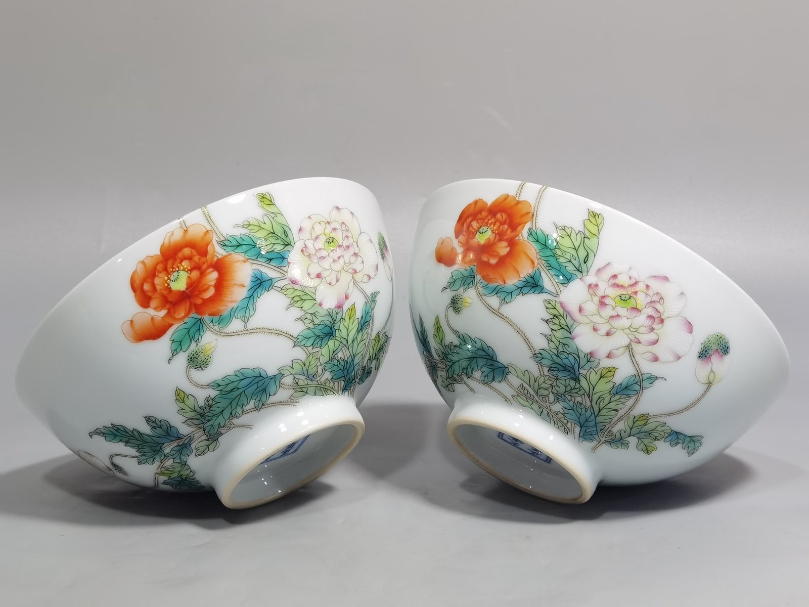 Qing Dynasty Yongzheng a pair of Yangcai poppy bowls