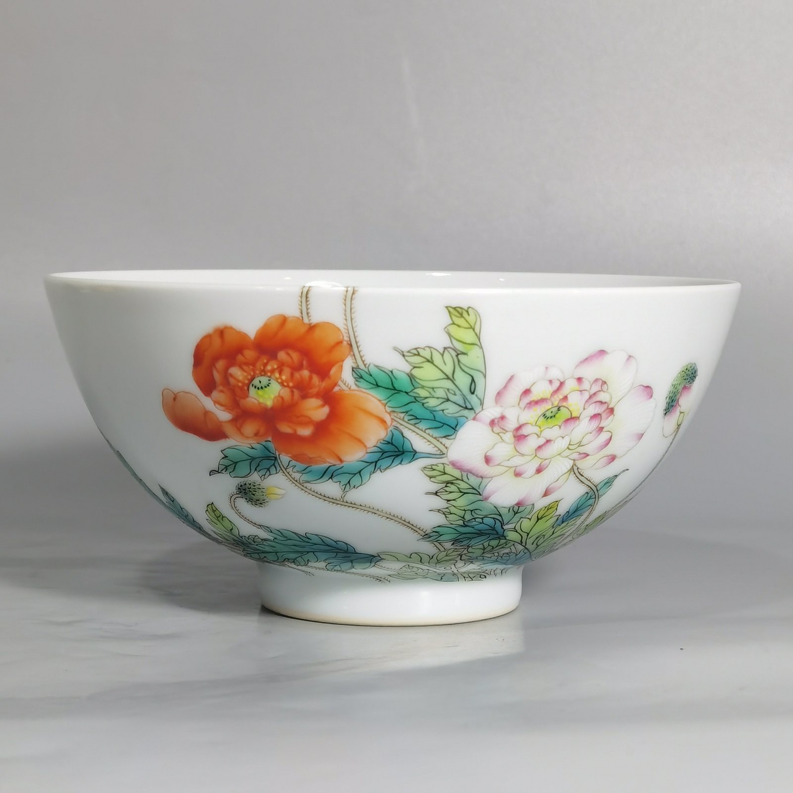 Qing Dynasty Yongzheng a pair of Yangcai poppy bowls