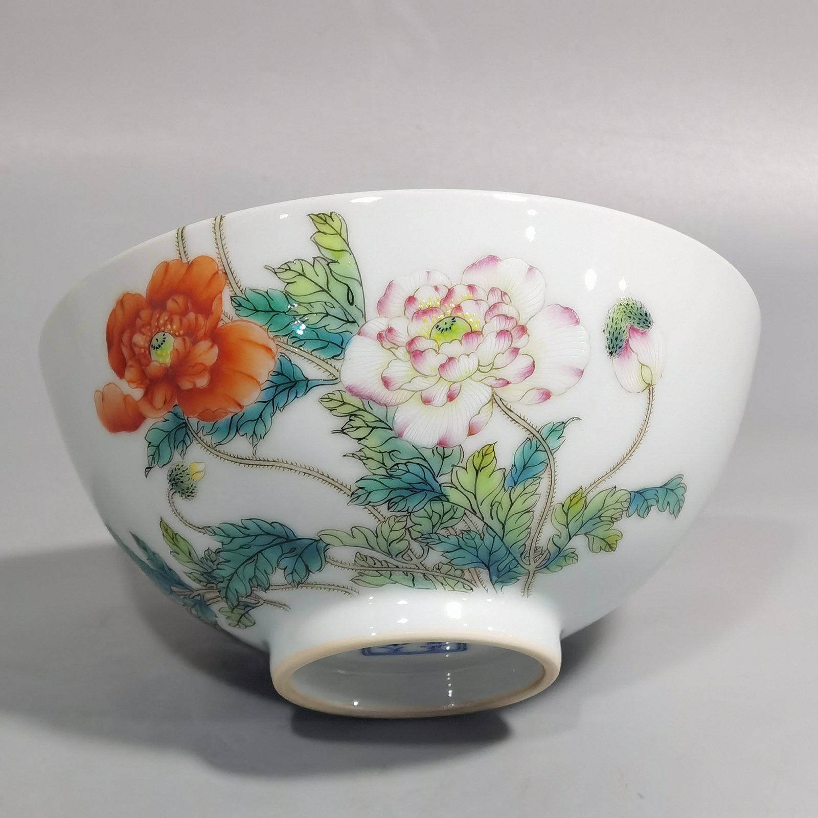 Qing Dynasty Yongzheng a pair of Yangcai poppy bowls