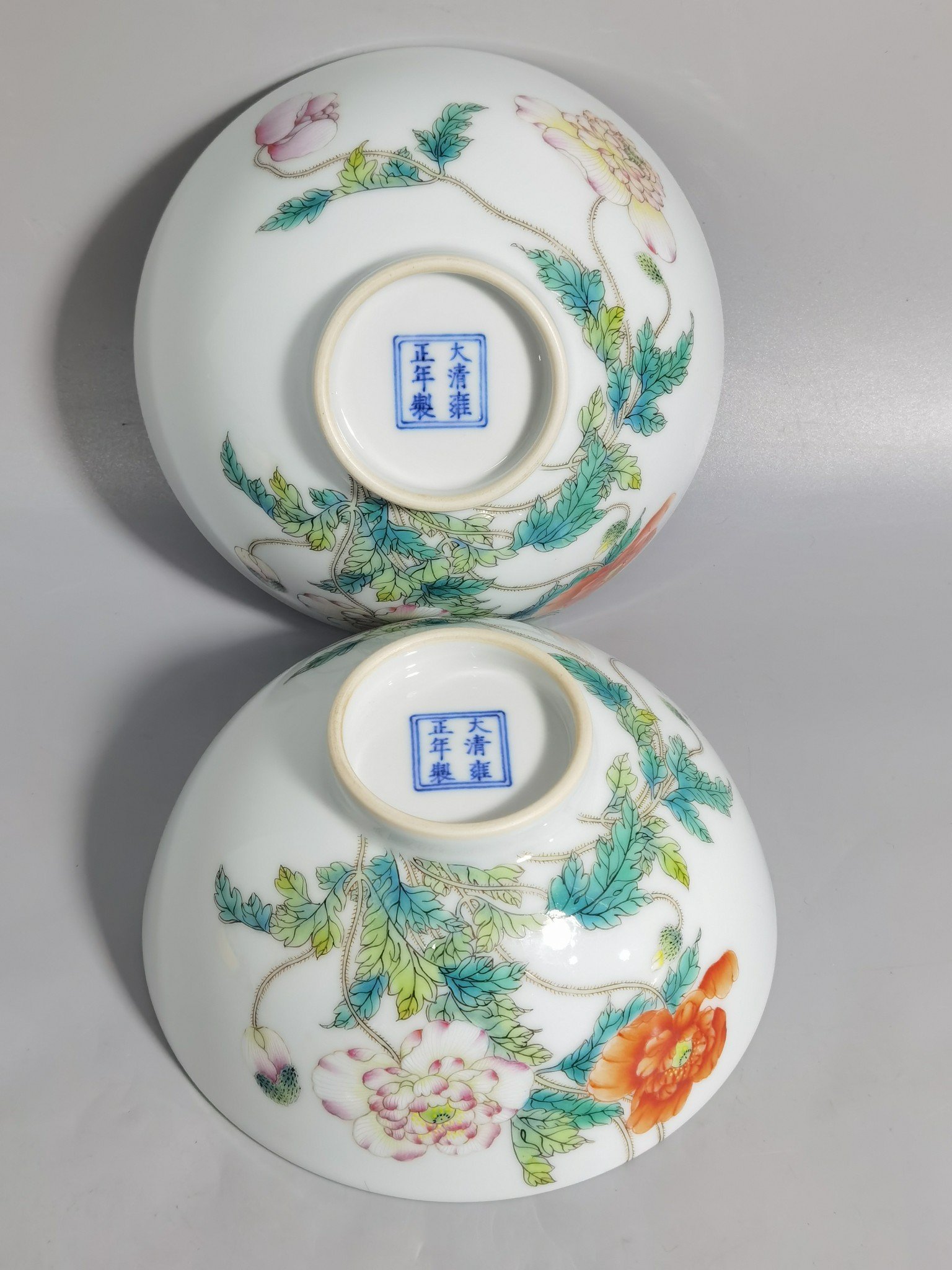 Qing Dynasty Yongzheng a pair of Yangcai poppy bowls
