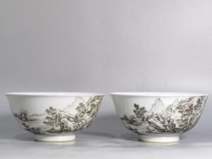 Qing Dynasty Yongzheng A pair of enamel and ink landscape and figure bowls