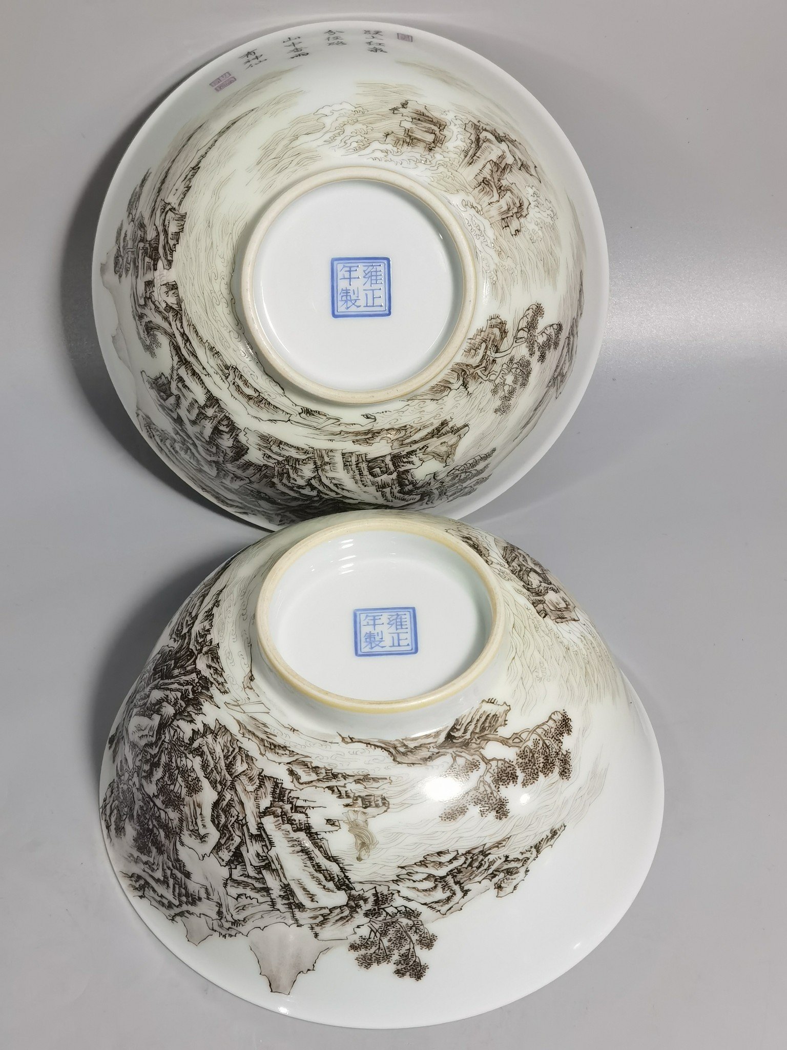 Qing Dynasty Yongzheng A pair of enamel and ink landscape and figure bowls