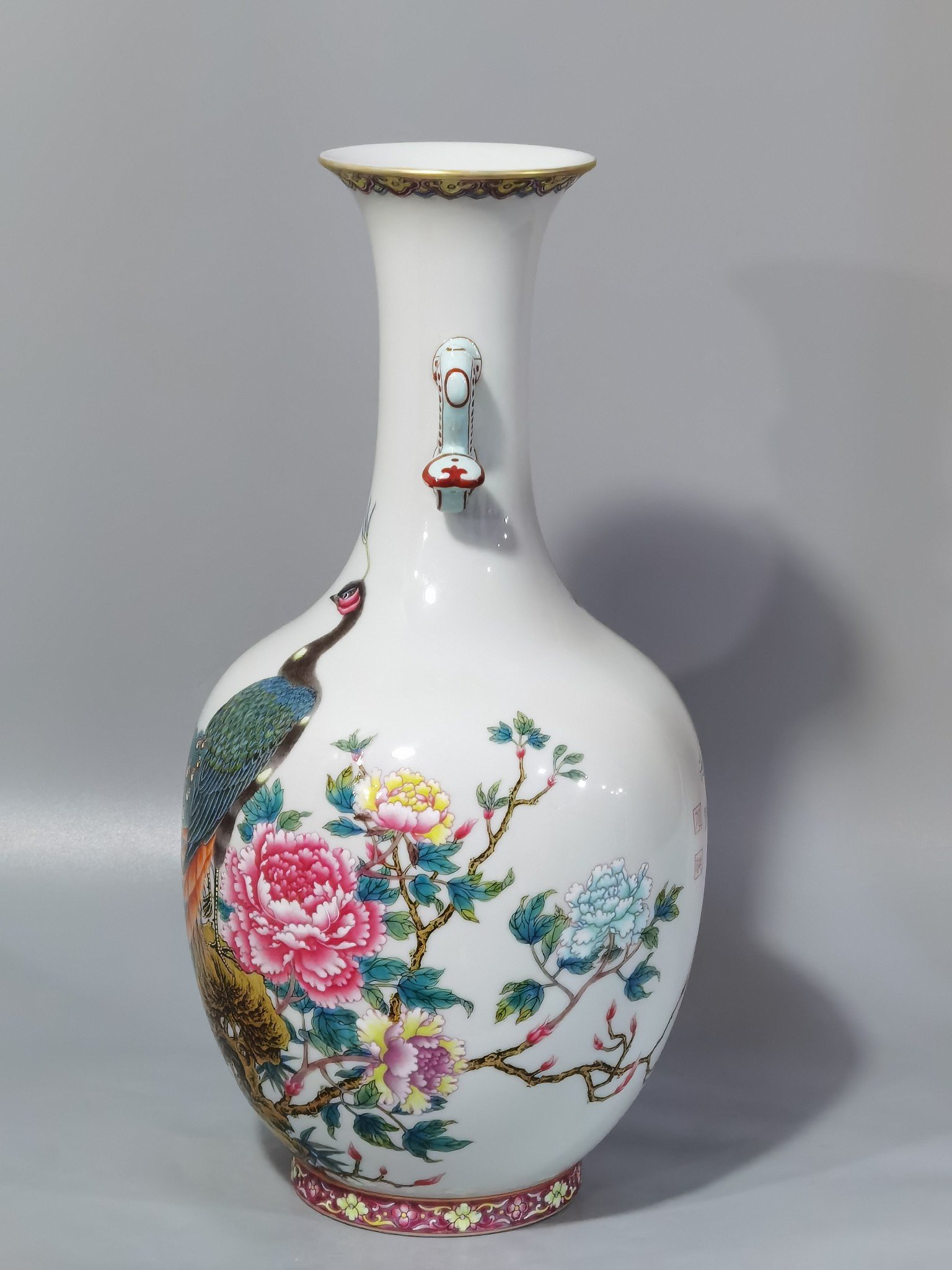 Qing Dynasty Yongzheng enamel peacock peony and flower Ruyi ear vase