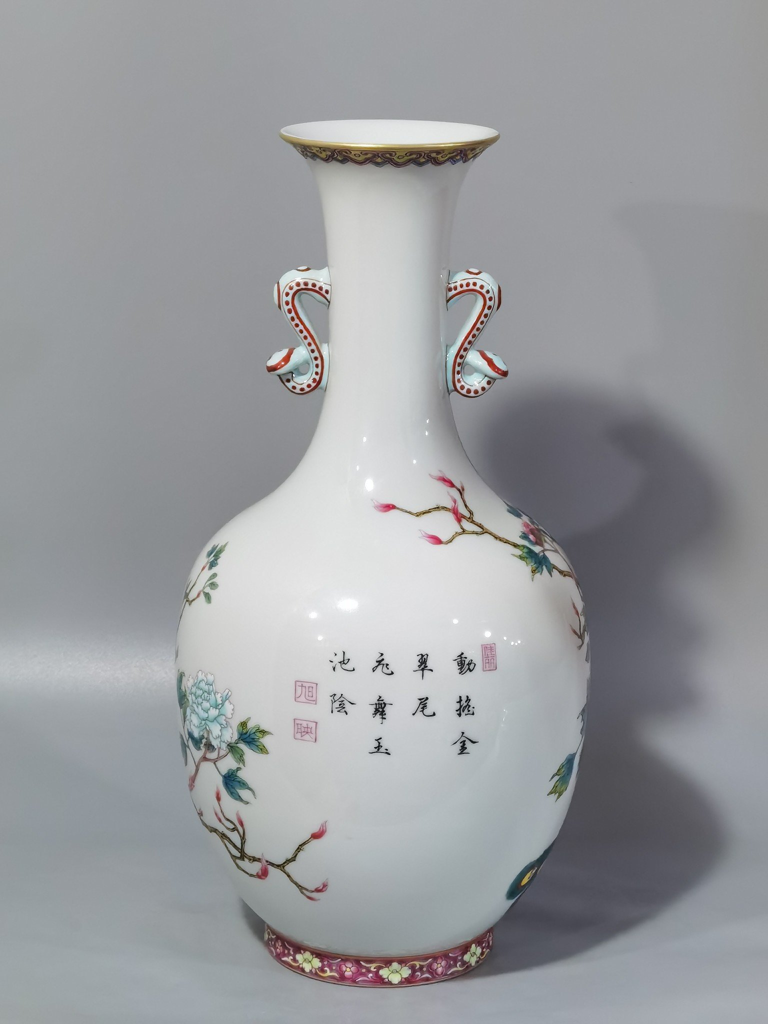 Qing Dynasty Yongzheng enamel peacock peony and flower Ruyi ear vase