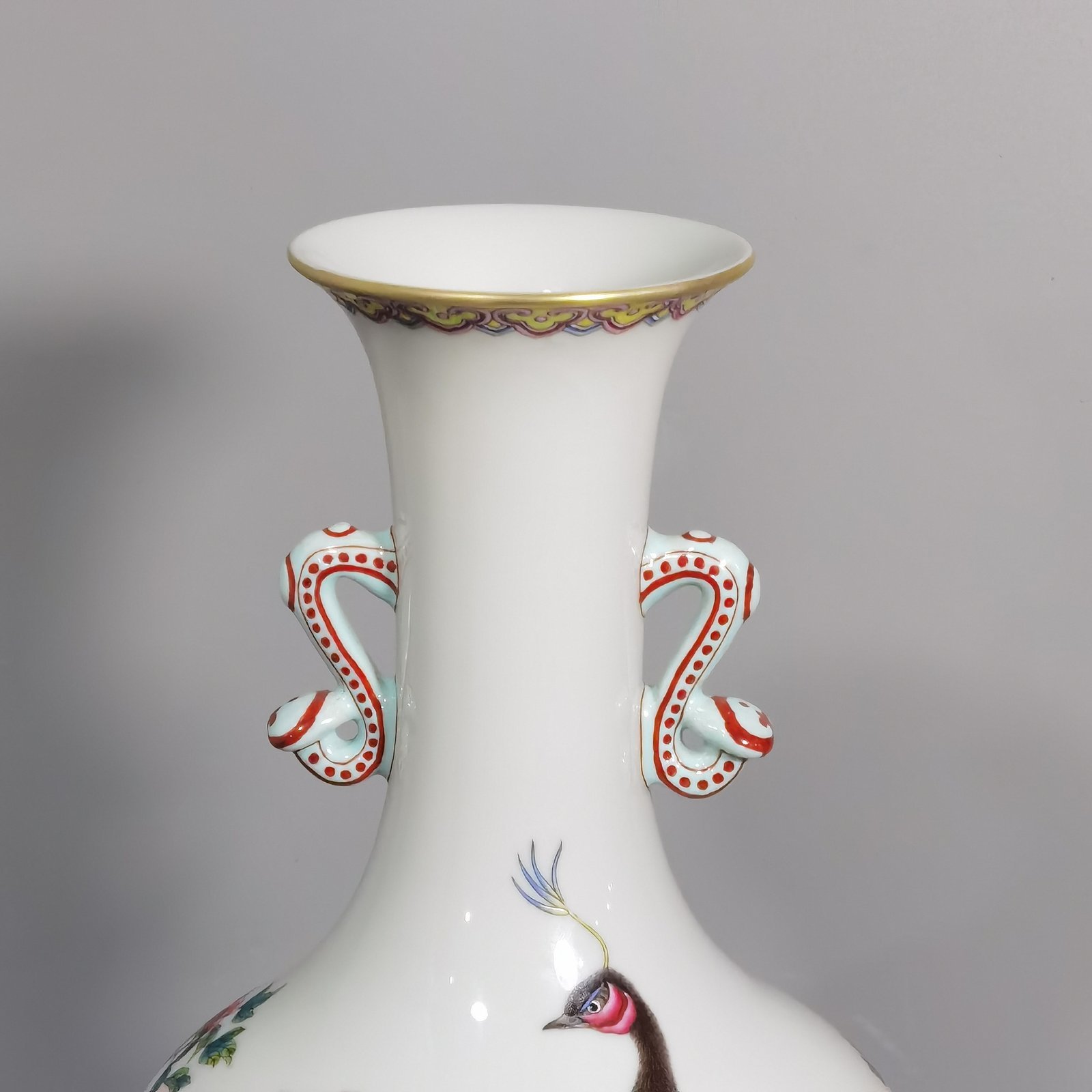 Qing Dynasty Yongzheng enamel peacock peony and flower Ruyi ear vase