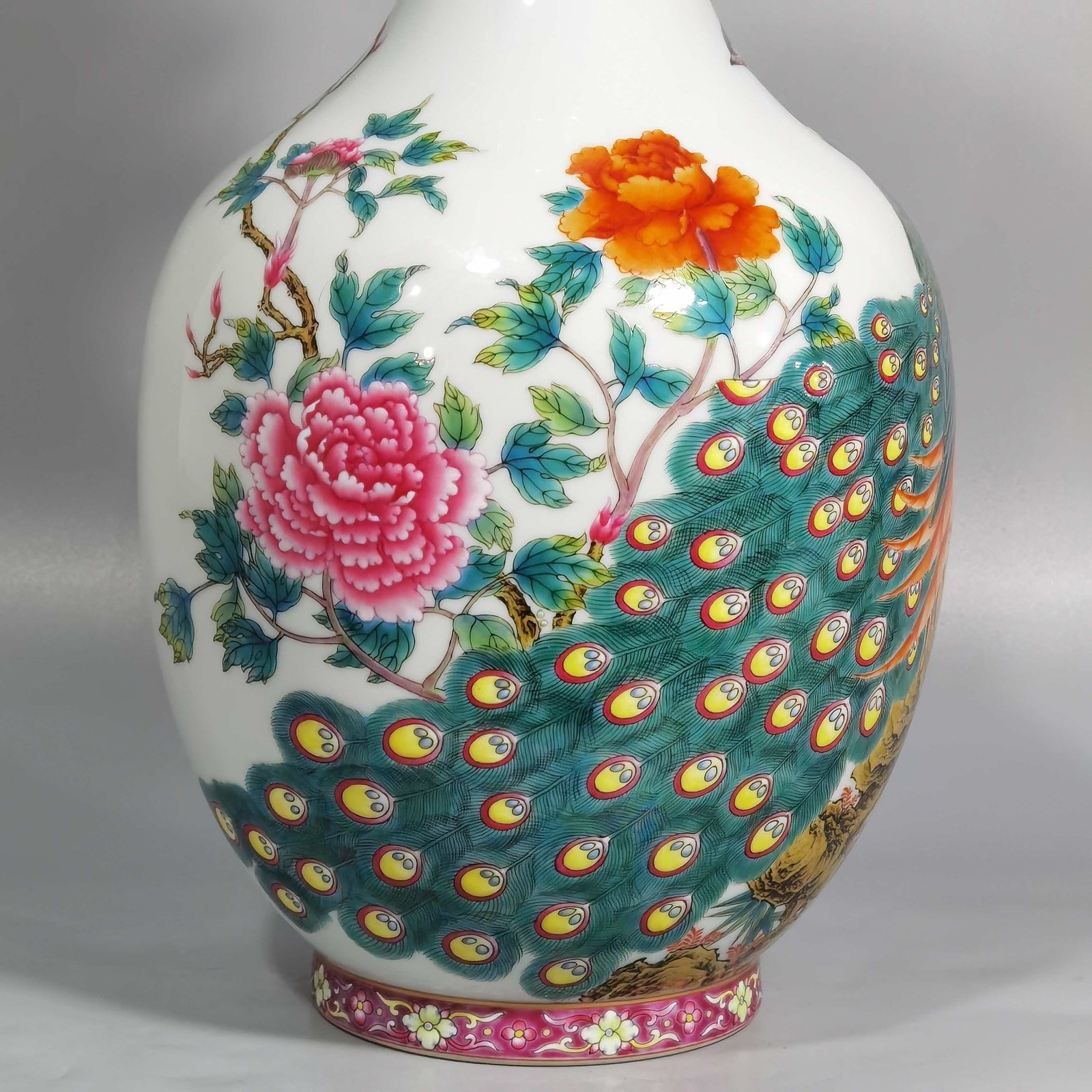 Qing Dynasty Yongzheng enamel peacock peony and flower Ruyi ear vase