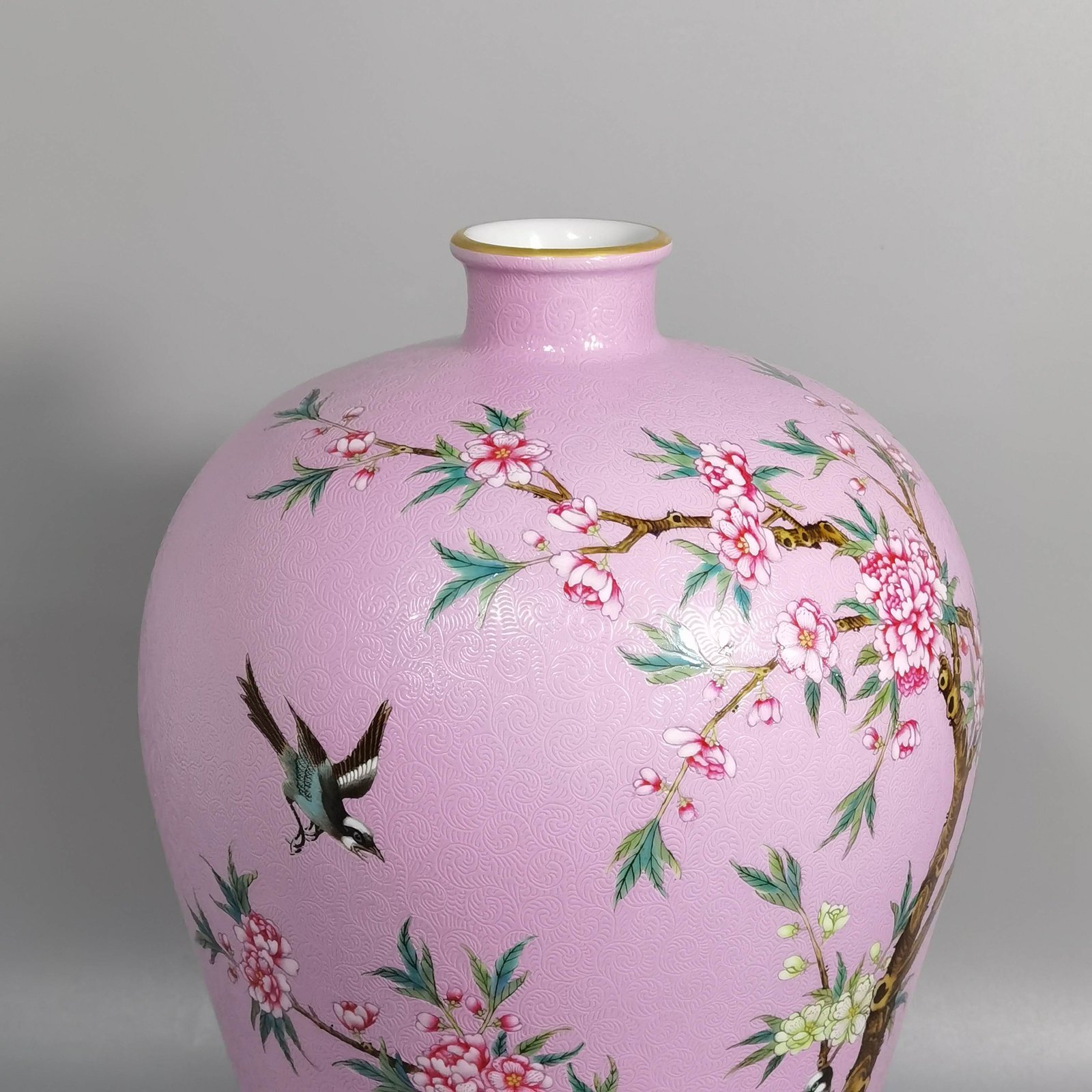 Qing Dynasty Yongzheng A pair of enamel peach blossom magpie and plum vases