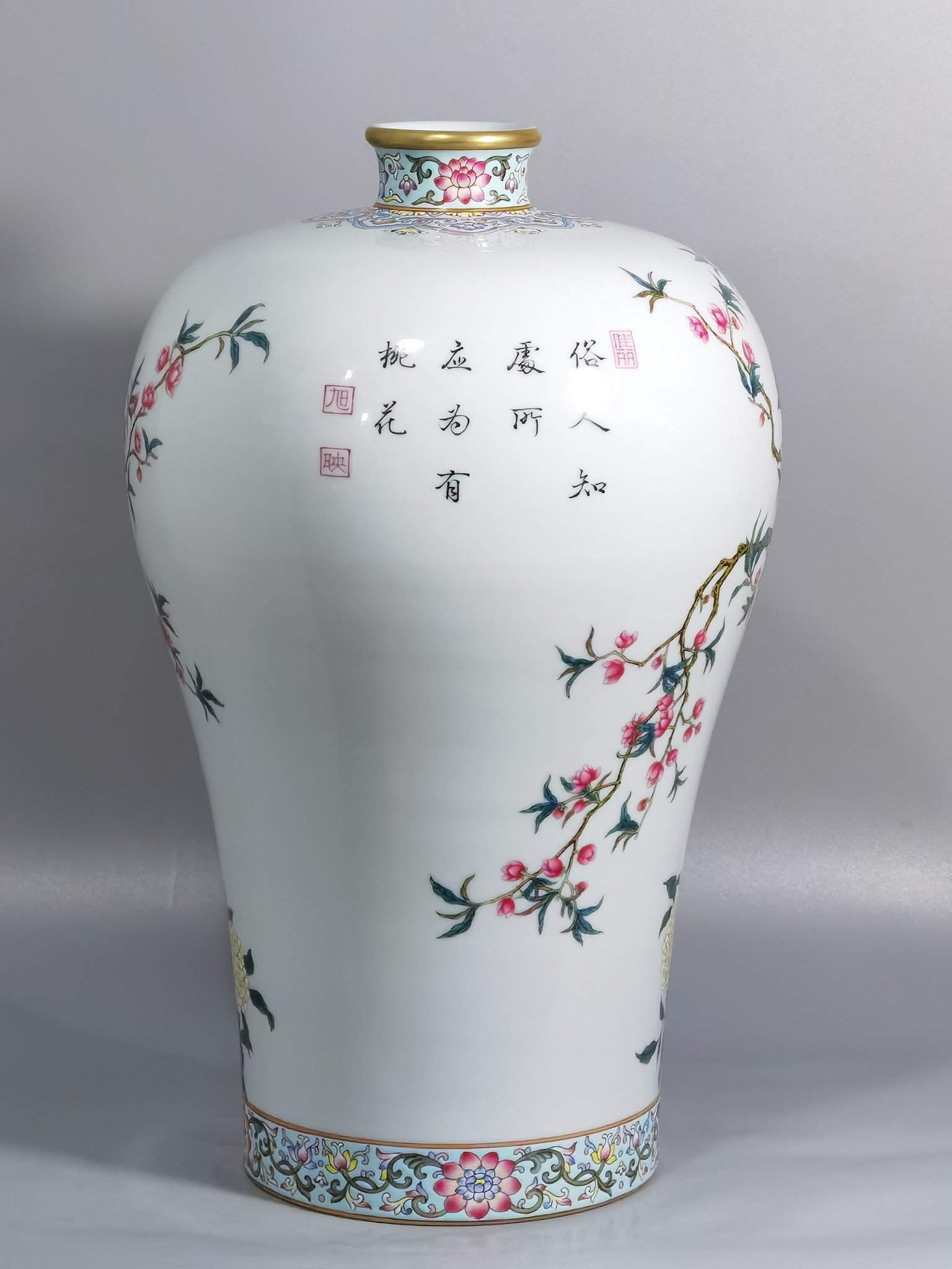 Qing Dynasty Yongzheng enamel plum vase with peach blossoms and magpie poems