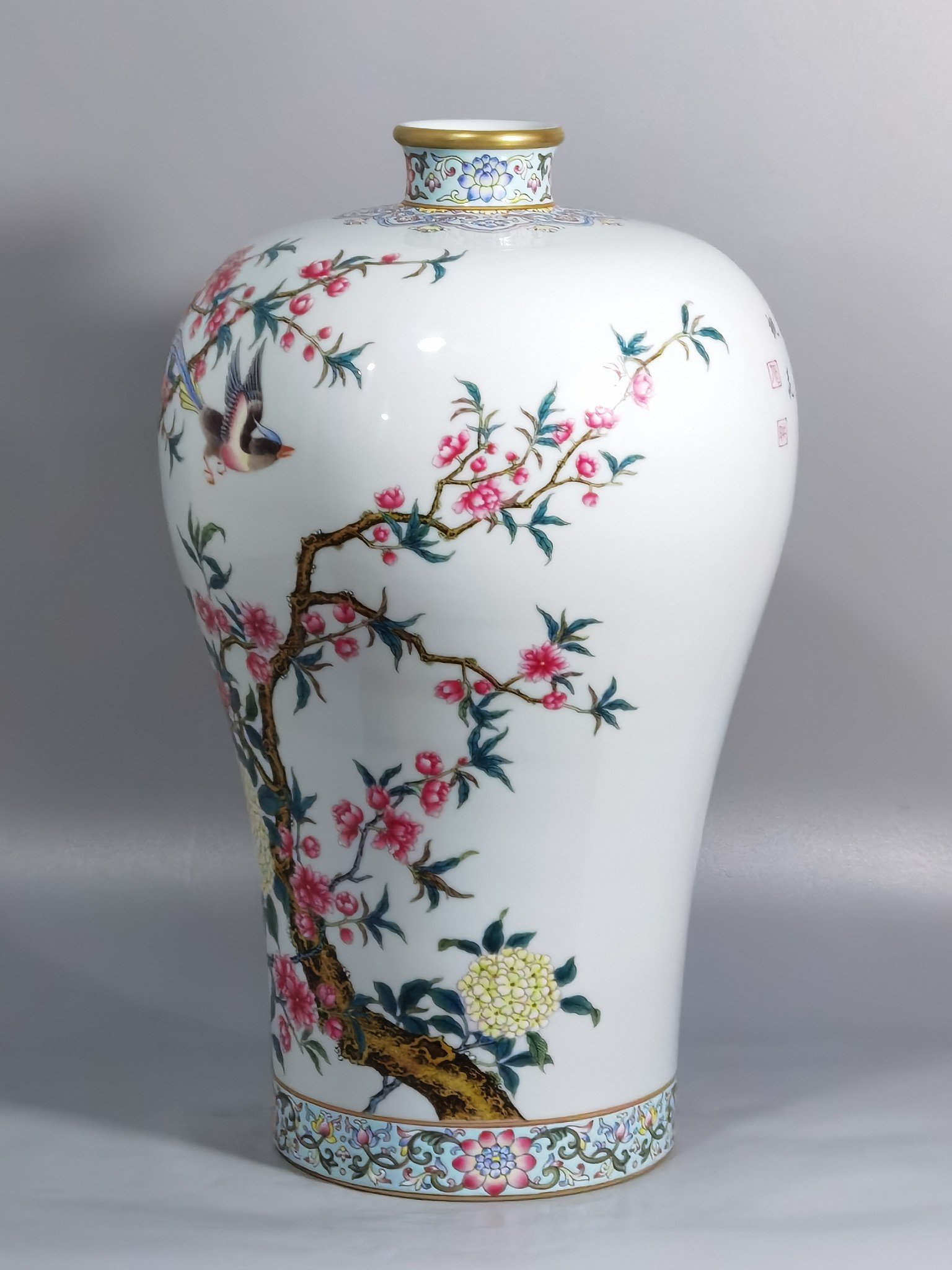 Qing Dynasty Yongzheng enamel plum vase with peach blossoms and magpie poems
