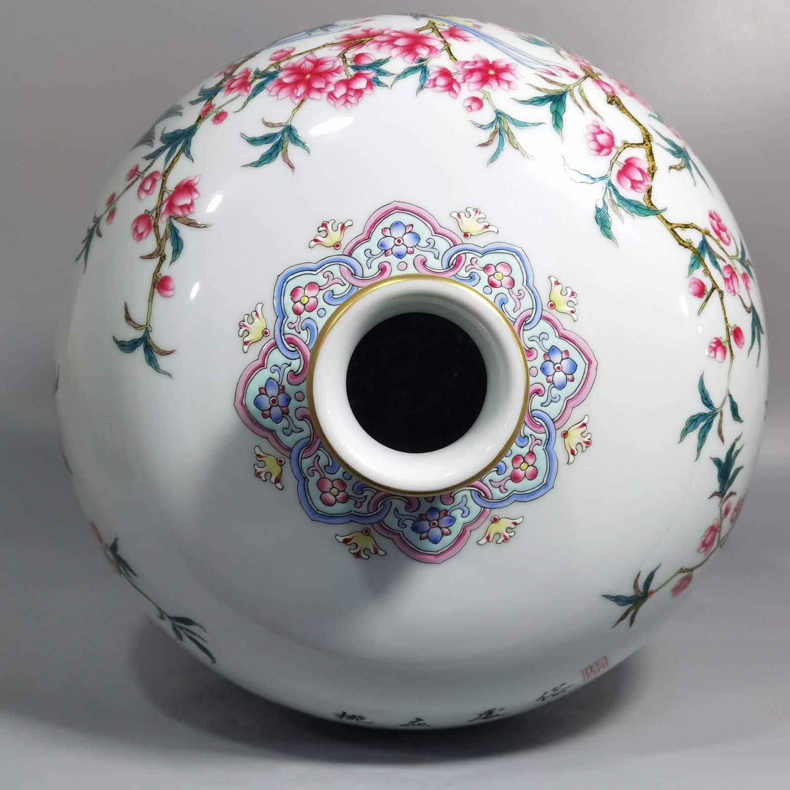 Qing Dynasty Yongzheng enamel plum vase with peach blossoms and magpie poems