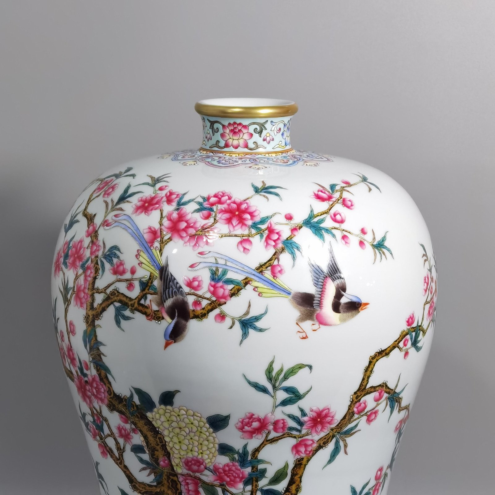 Qing Dynasty Yongzheng enamel plum vase with peach blossoms and magpie poems