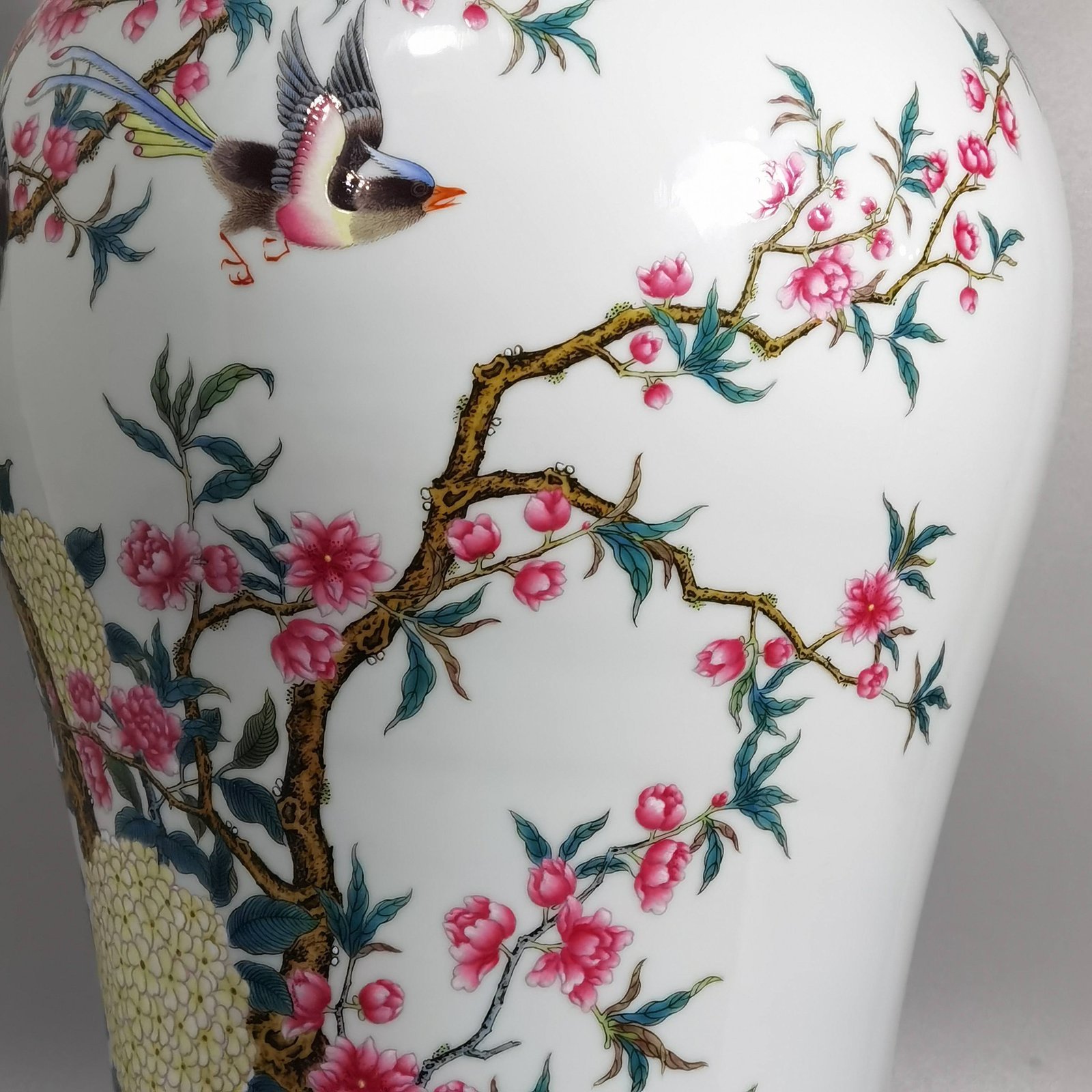 Qing Dynasty Yongzheng enamel plum vase with peach blossoms and magpie poems